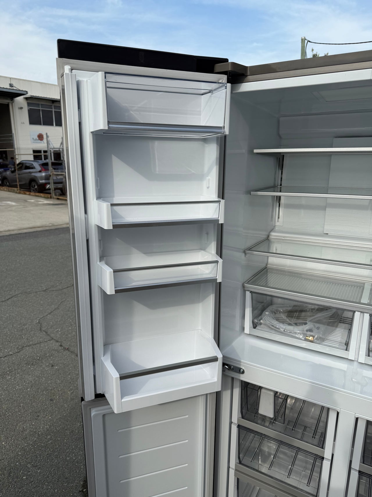 Factory Second Fisher & Paykel 538L Quad Door Refrigerator with Ice and Water Black Stainless Steel RF605QNUVB1 - Second Hand Appliances Geebung