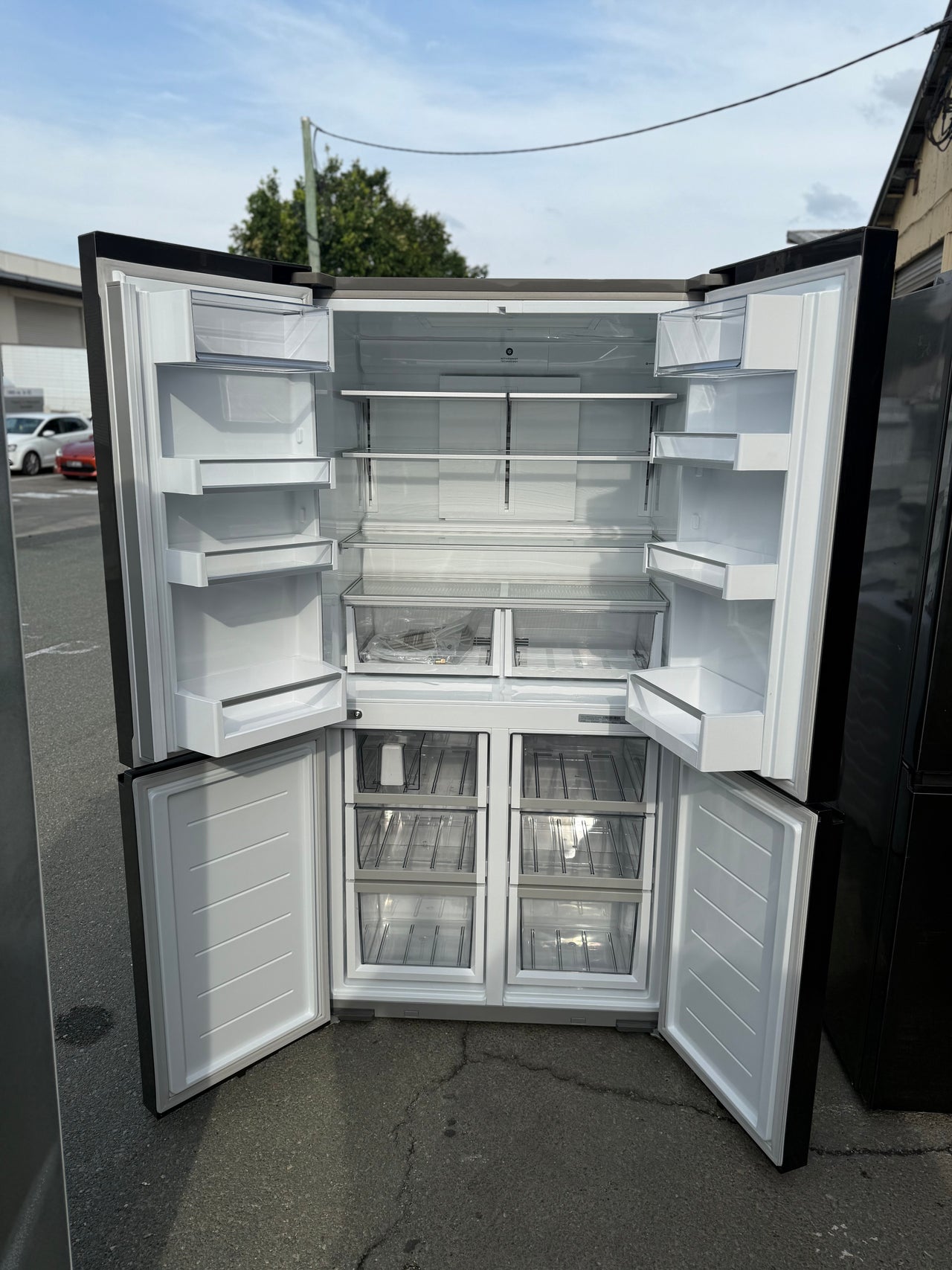 Factory Second Fisher & Paykel 538L Quad Door Refrigerator with Ice and Water Black Stainless Steel RF605QNUVB1 - Second Hand Appliances Geebung