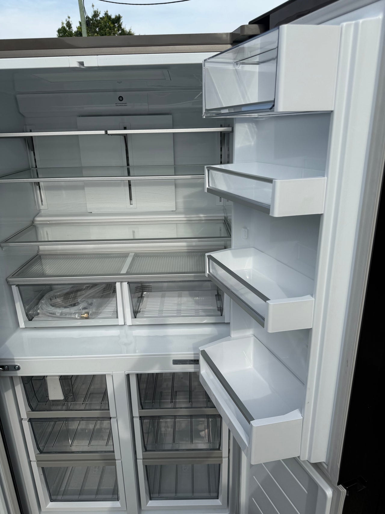 Factory Second Fisher & Paykel 538L Quad Door Refrigerator with Ice and Water Black Stainless Steel RF605QNUVB1 - Second Hand Appliances Geebung