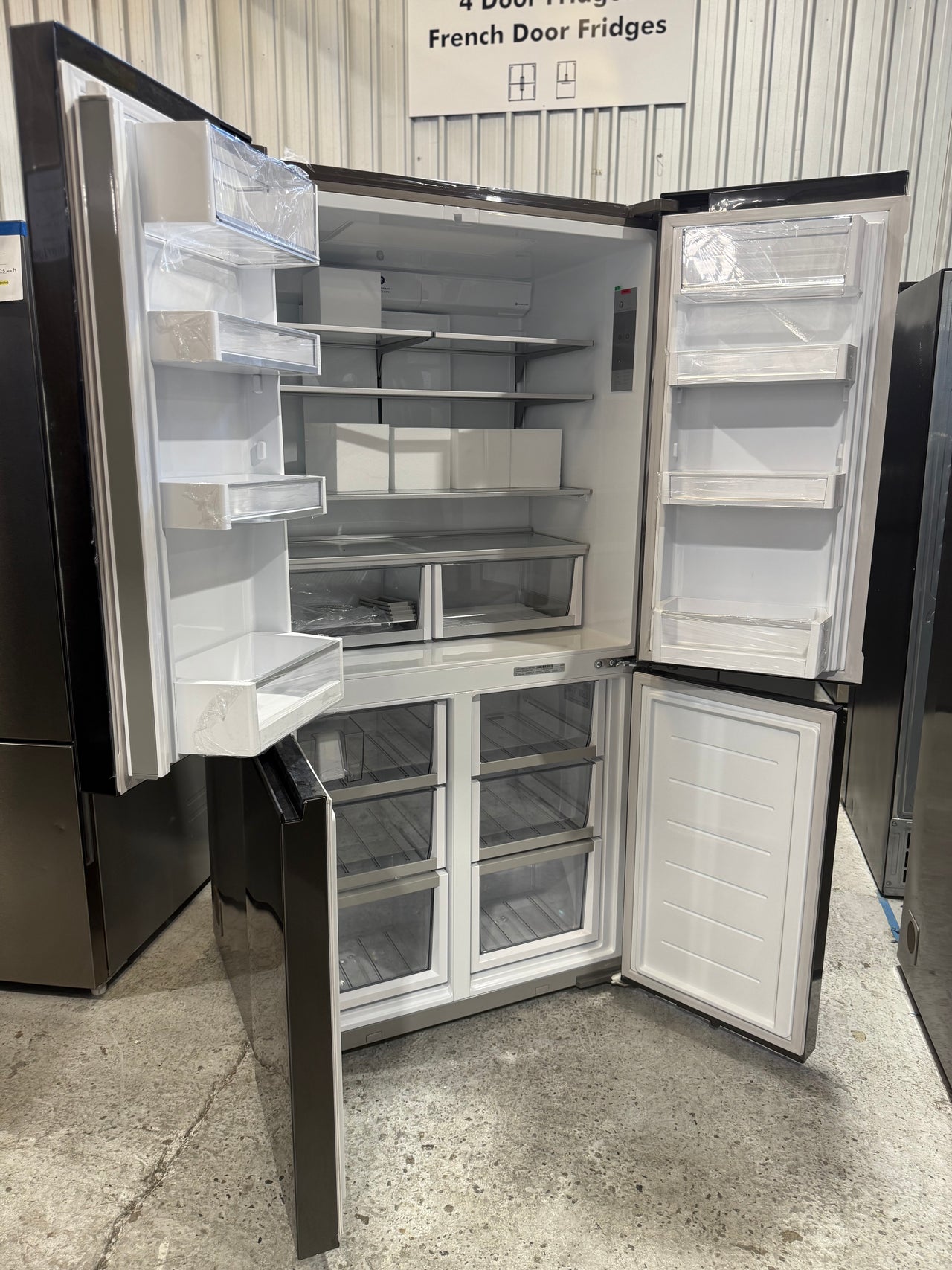 Factory second Fisher &amp; Paykel 538L Quad Door Refrigerator with Ice and Water Black Stainless Steel  Model: RF605QNUVB1 - Second Hand Appliances Geebung