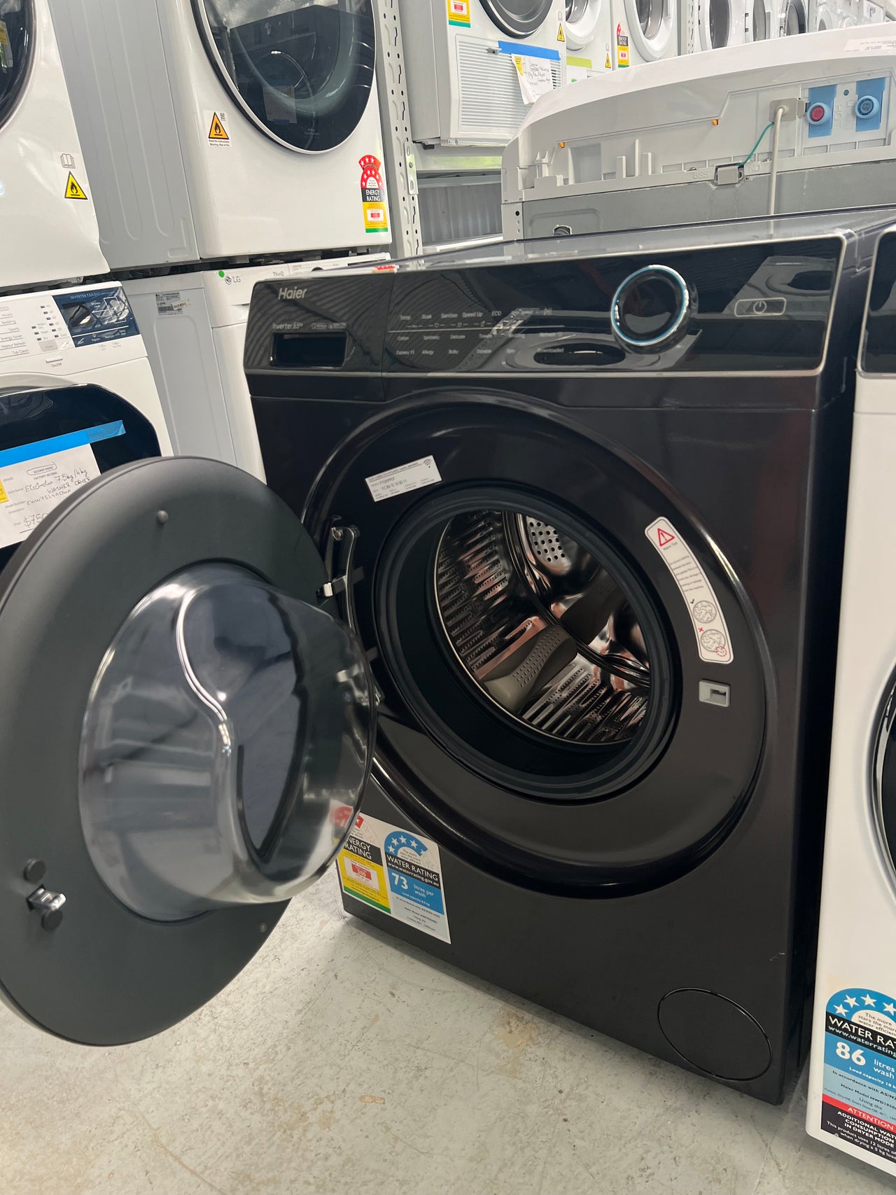 Factory second Haier HWF85ANB1 8.5kg Front Load Washing Machine (Graphite) - Second Hand Appliances Geebung