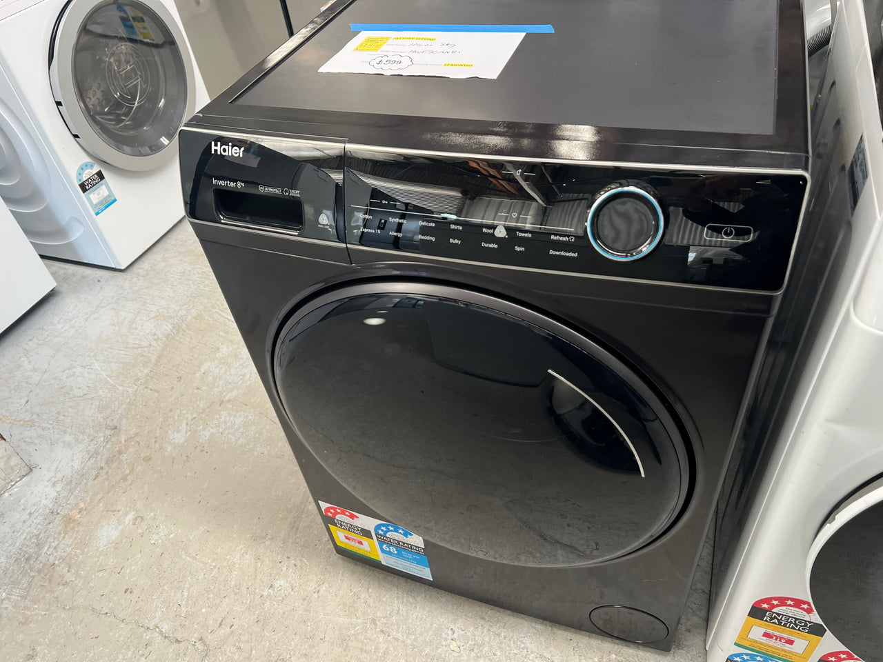 Transportation damaged Haier 8kg Front Load Washer HWF80ANB1 - Second Hand Appliances Geebung