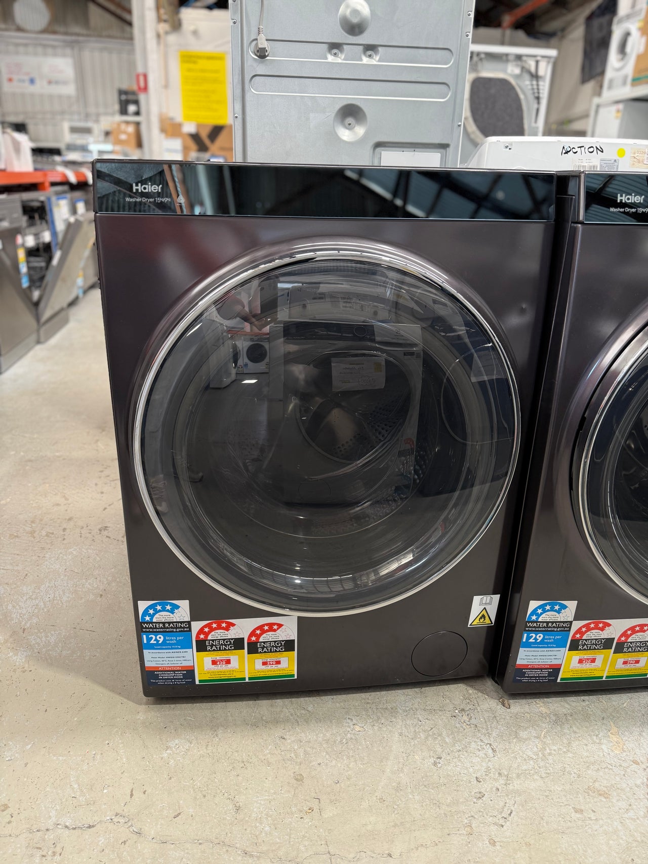 Factory second Haier HWDX1590CTB1 premium 2-in-1 front load washer dryer - Second Hand Appliances Geebung