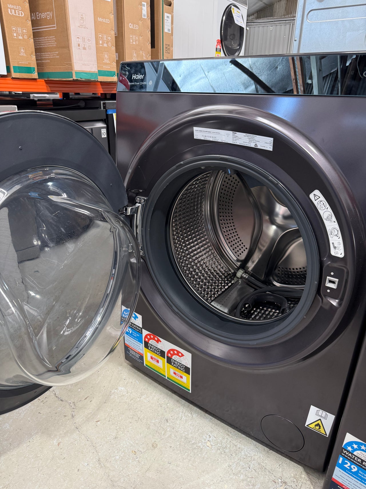 Factory second Haier HWDX1590CTB1 premium 2-in-1 front load washer dryer - Second Hand Appliances Geebung