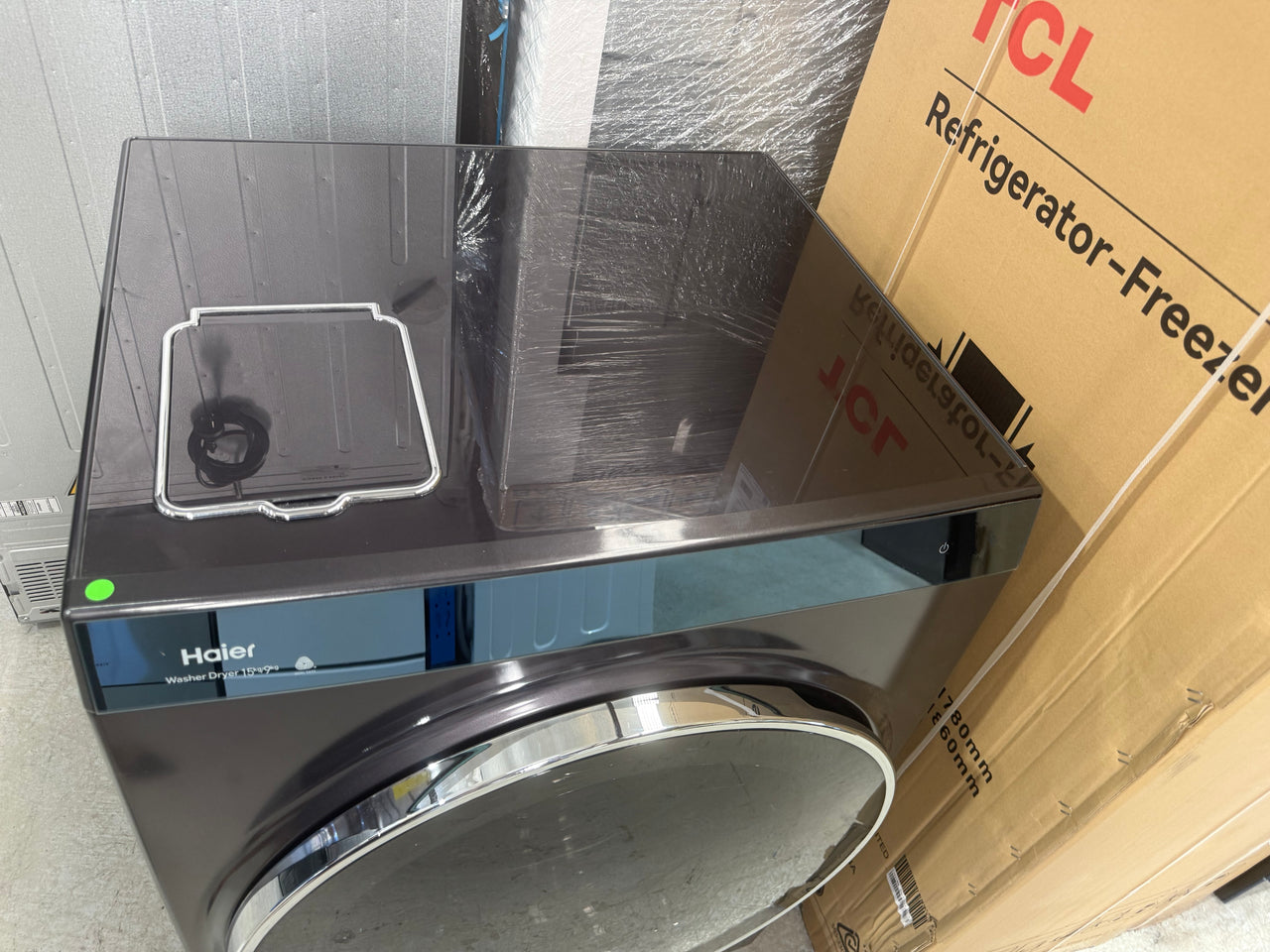 Factory second Haier HWDX1590CTB1 premium 2-in-1 front load washer dryer - Second Hand Appliances Geebung