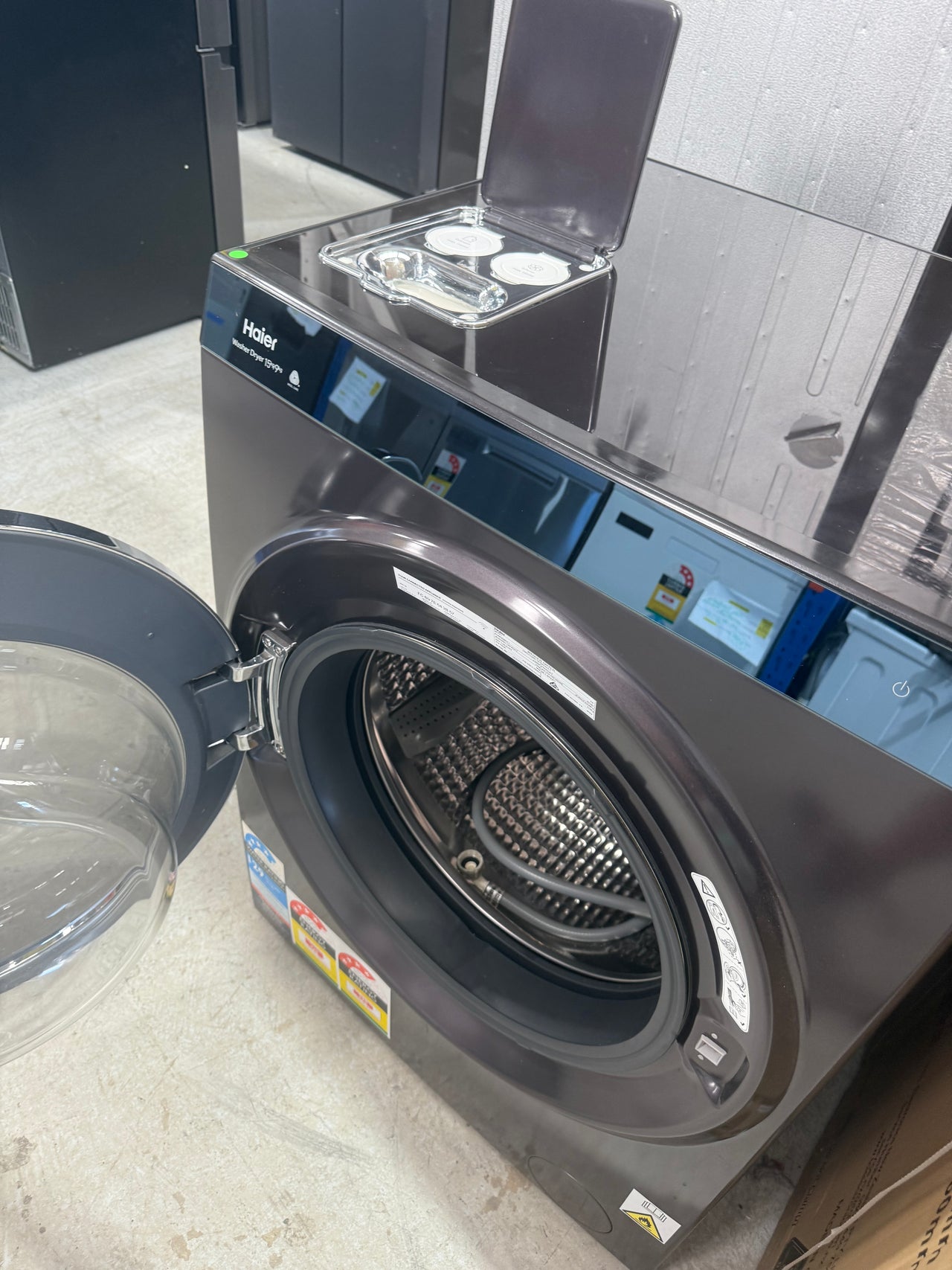 Factory second Haier HWDX1590CTB1 premium 2-in-1 front load washer dryer - Second Hand Appliances Geebung