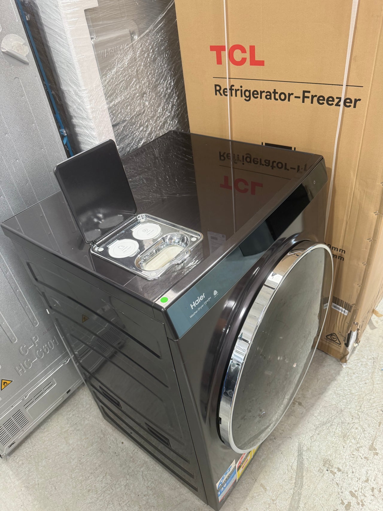 Factory second Haier HWDX1590CTB1 premium 2-in-1 front load washer dryer - Second Hand Appliances Geebung