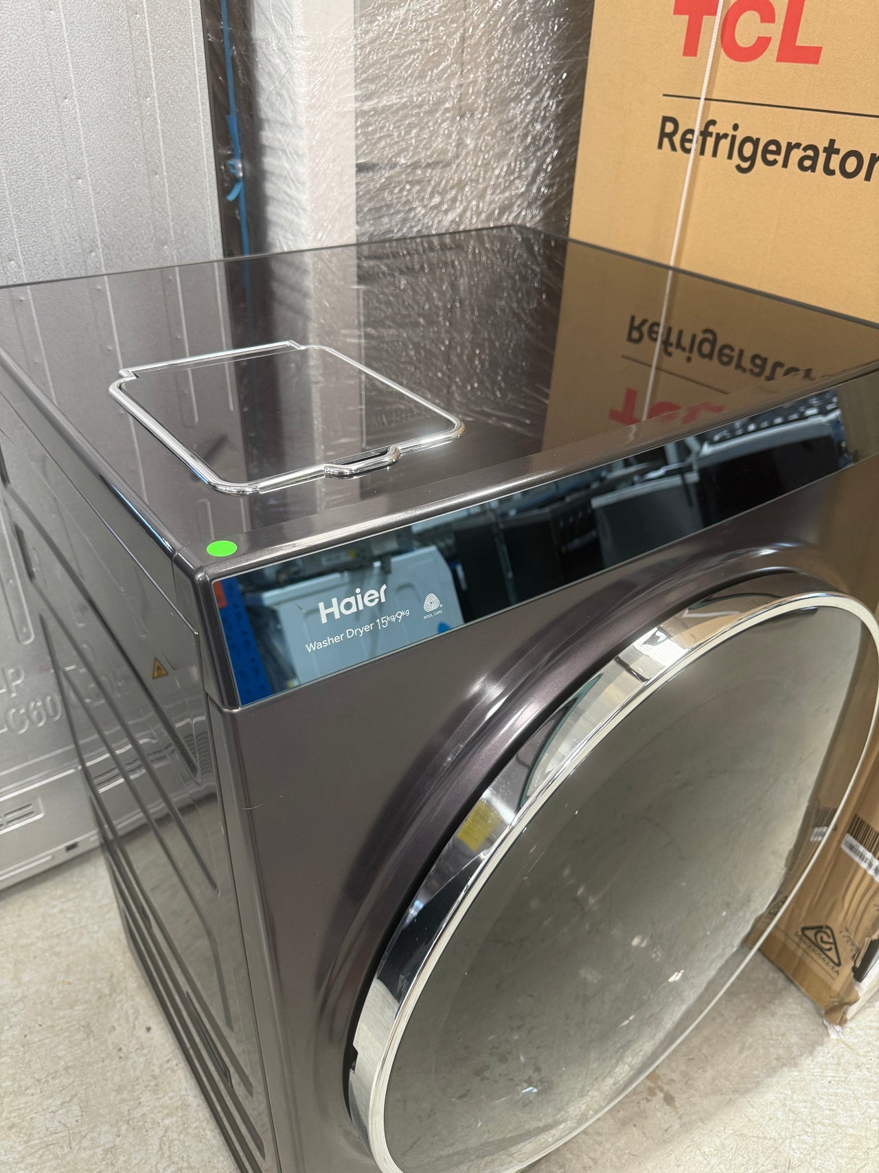 Factory second Haier HWDX1590CTB1 premium 2-in-1 front load washer dryer - Second Hand Appliances Geebung