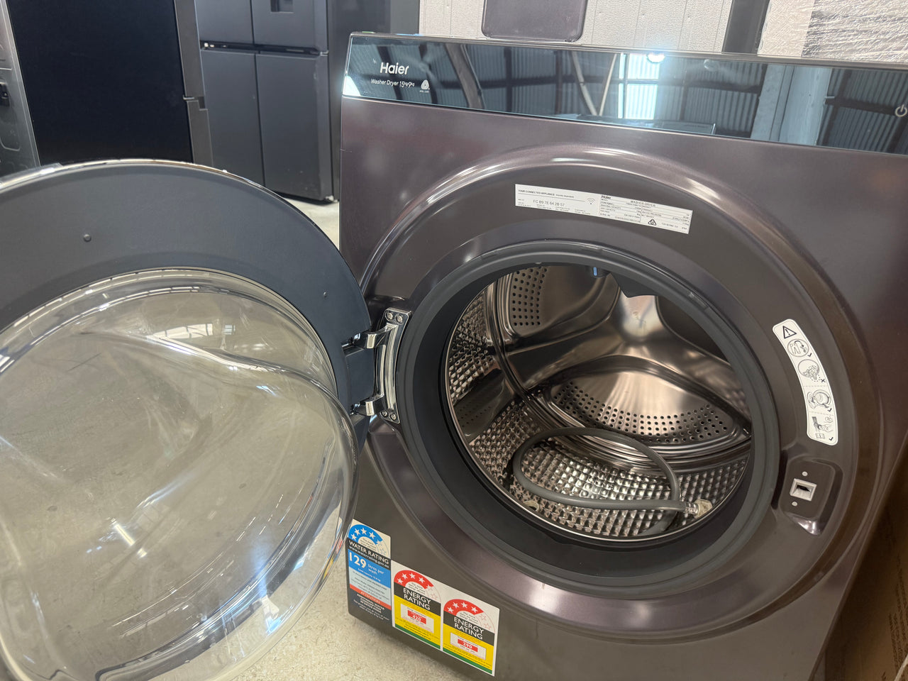 Factory second Haier HWDX1590CTB1 premium 2-in-1 front load washer dryer - Second Hand Appliances Geebung