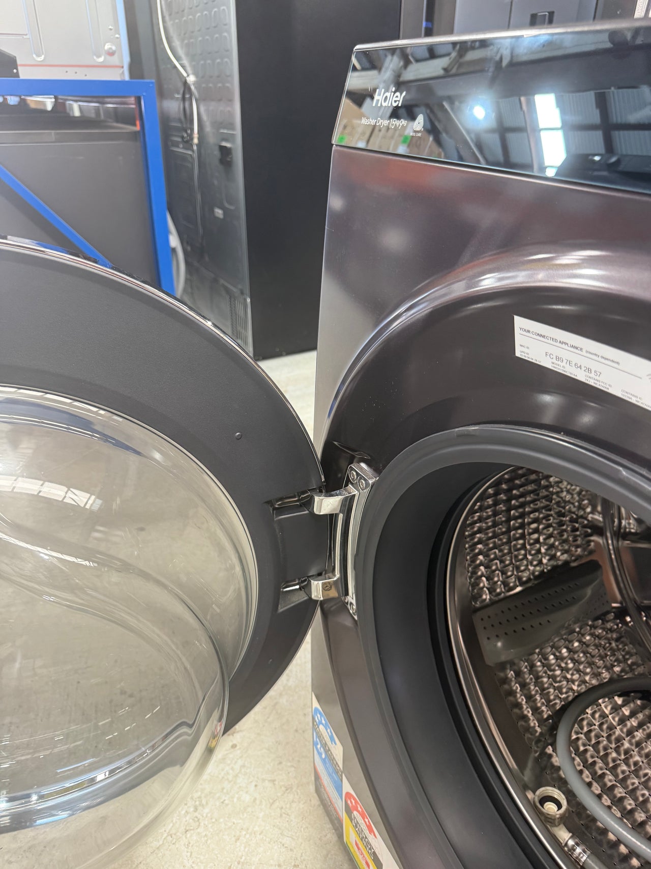 Factory second Haier HWDX1590CTB1 premium 2-in-1 front load washer dryer - Second Hand Appliances Geebung