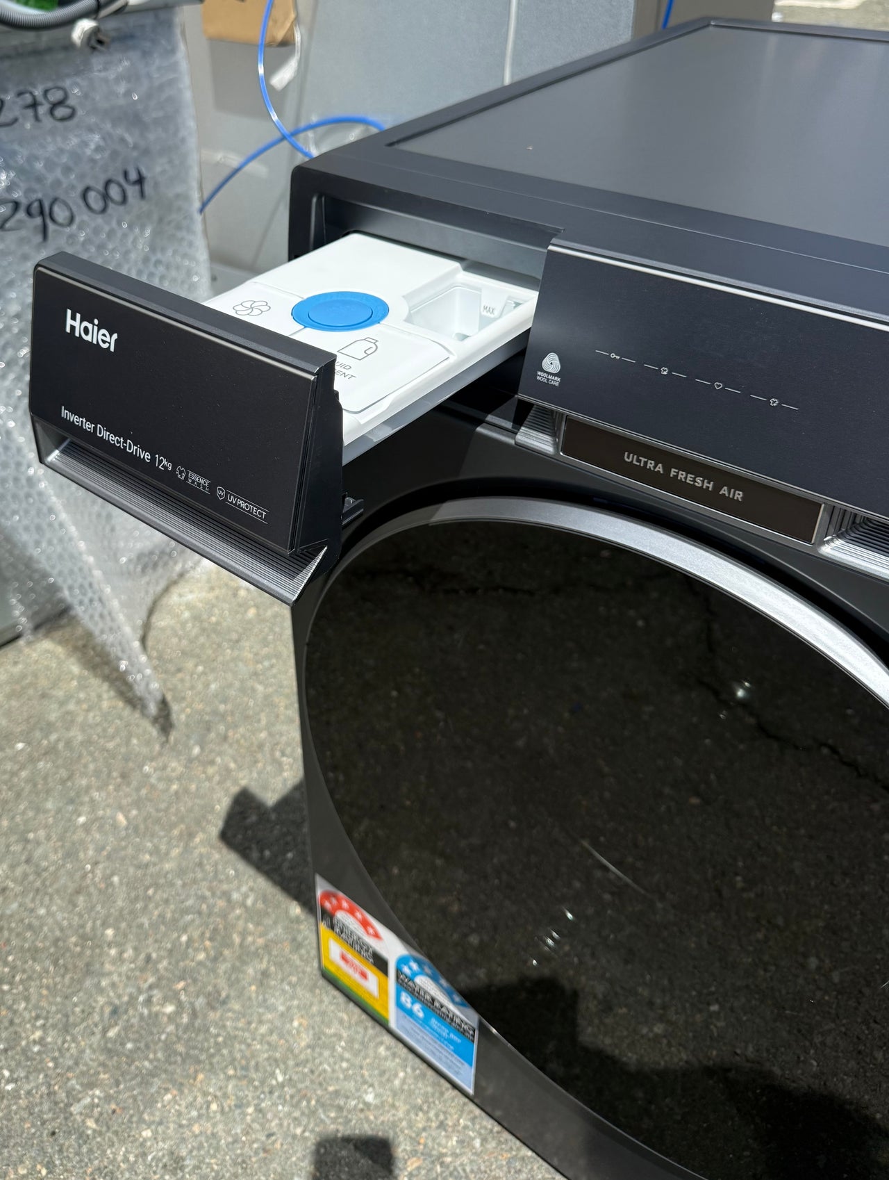 Factory second Haier HWF12DB1 12kg Front Load Washing Machine (NAT) - Second Hand Appliances Geebung