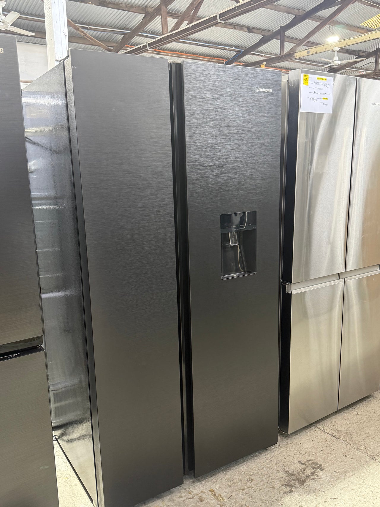 Factory second Westinghouse 664L Side by Side Refrigerator – Black Stainless Steel Model: WSE6640BA - Second Hand Appliances Geebung