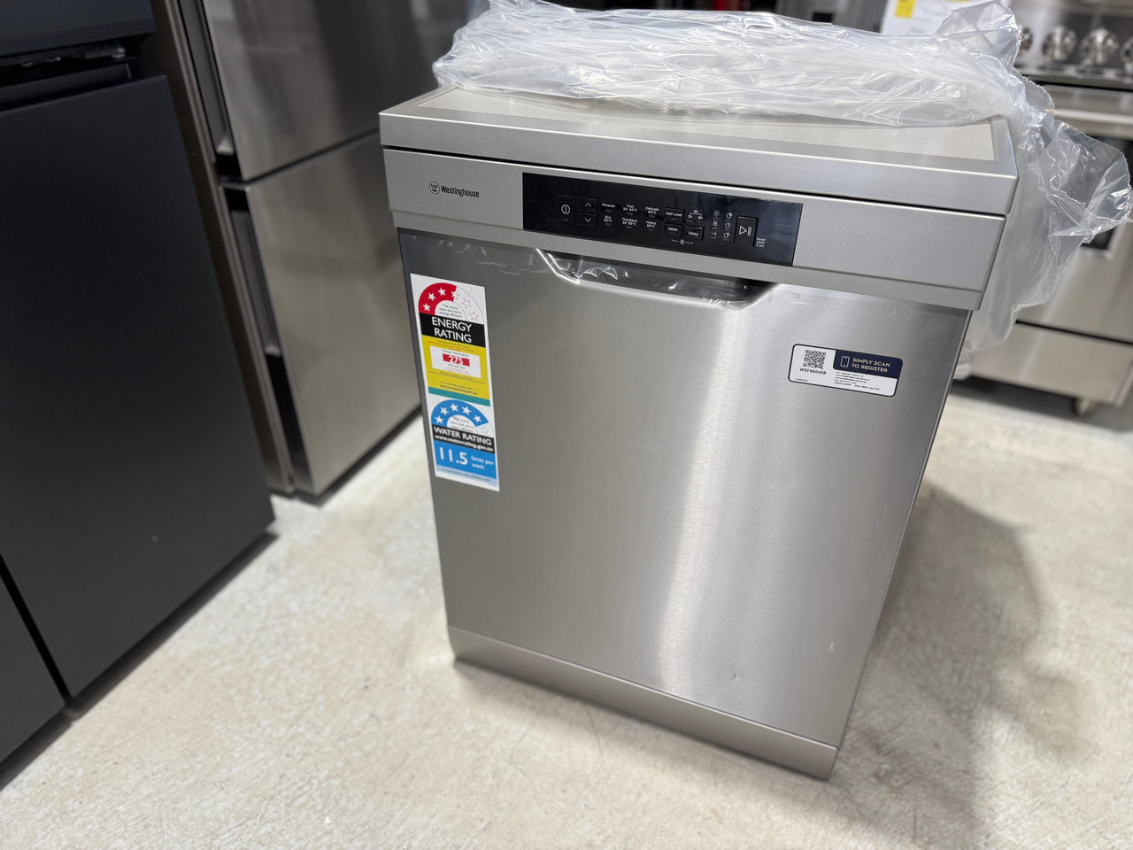 Factory second Westinghouse WSF6604XA 60cm freestanding stainless steel dishwasher - Second Hand Appliances Geebung