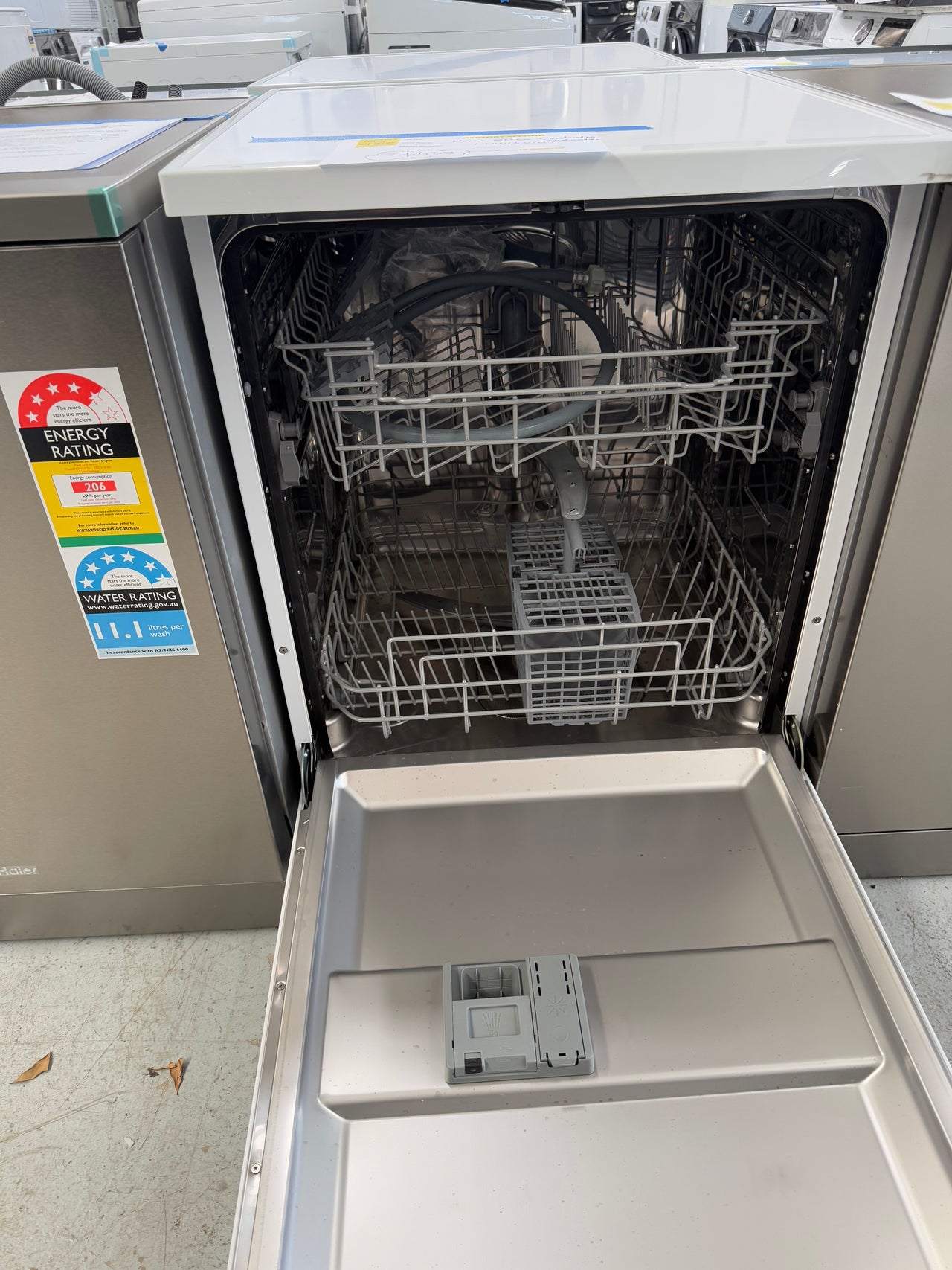 Factory second Haier HDW13V1W1 freestanding dishwasher