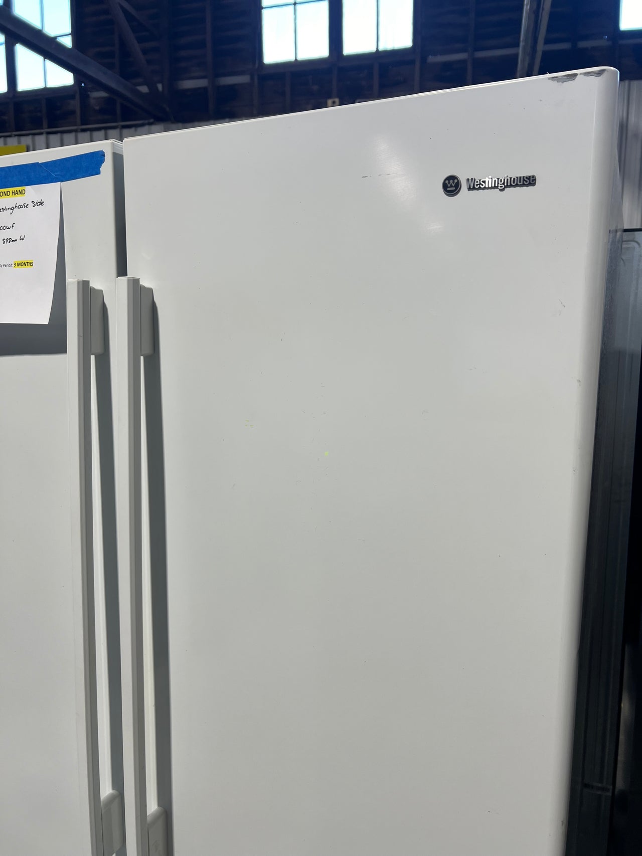 Second hand 606l Westinghouse side by side refrigerator Model: WSE6100WF - Second Hand Appliances Geebung