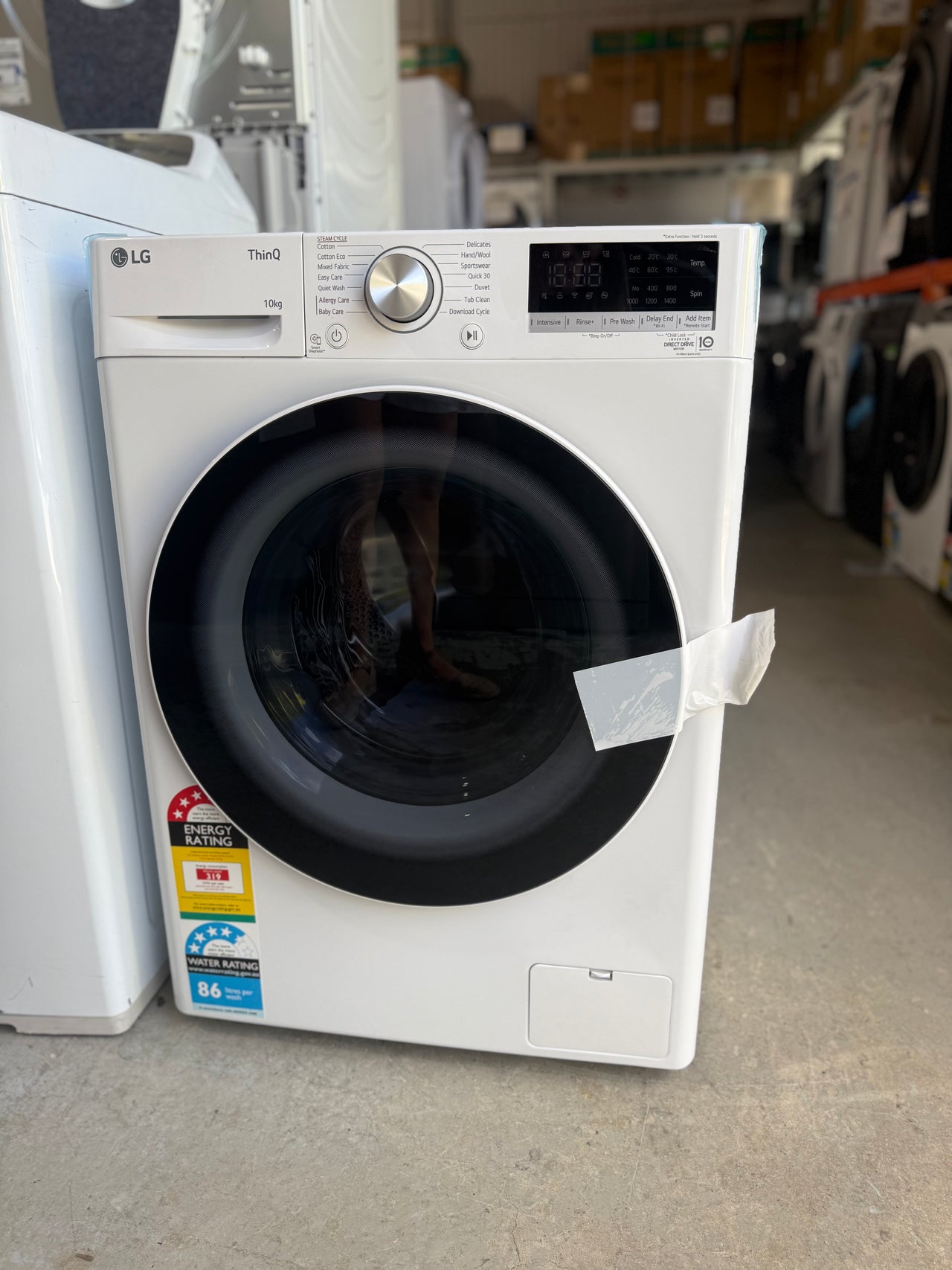 Transportation damaged LG 10kg Front Load Washer with Steam – White (Model WV5-1410W)