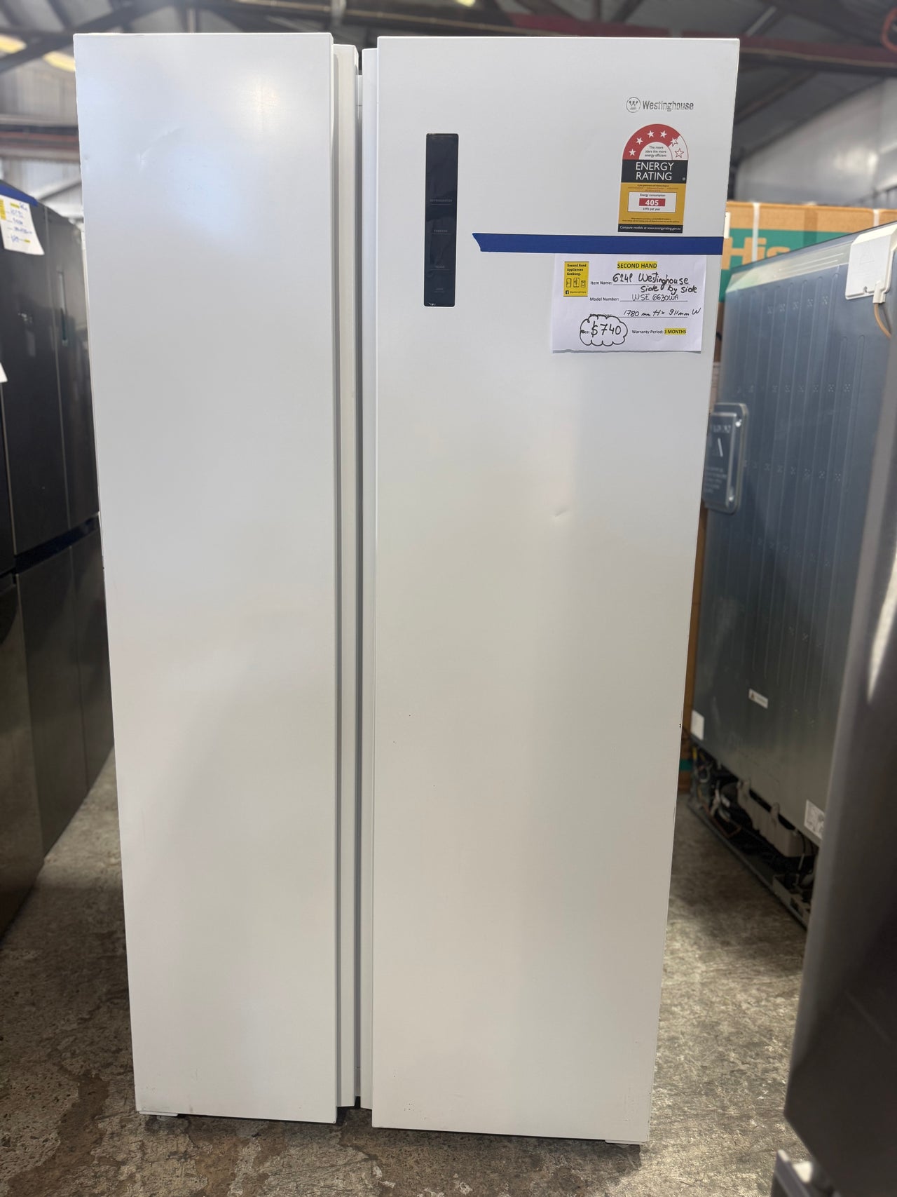 Second hand Westinghouse WSE6630WA 624L Side by Side Fridge