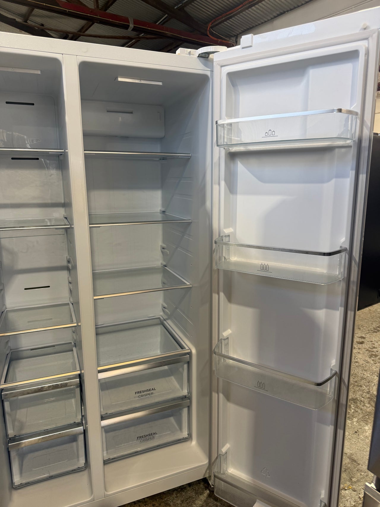 Second hand Westinghouse WSE6630WA 624L Side by Side Fridge