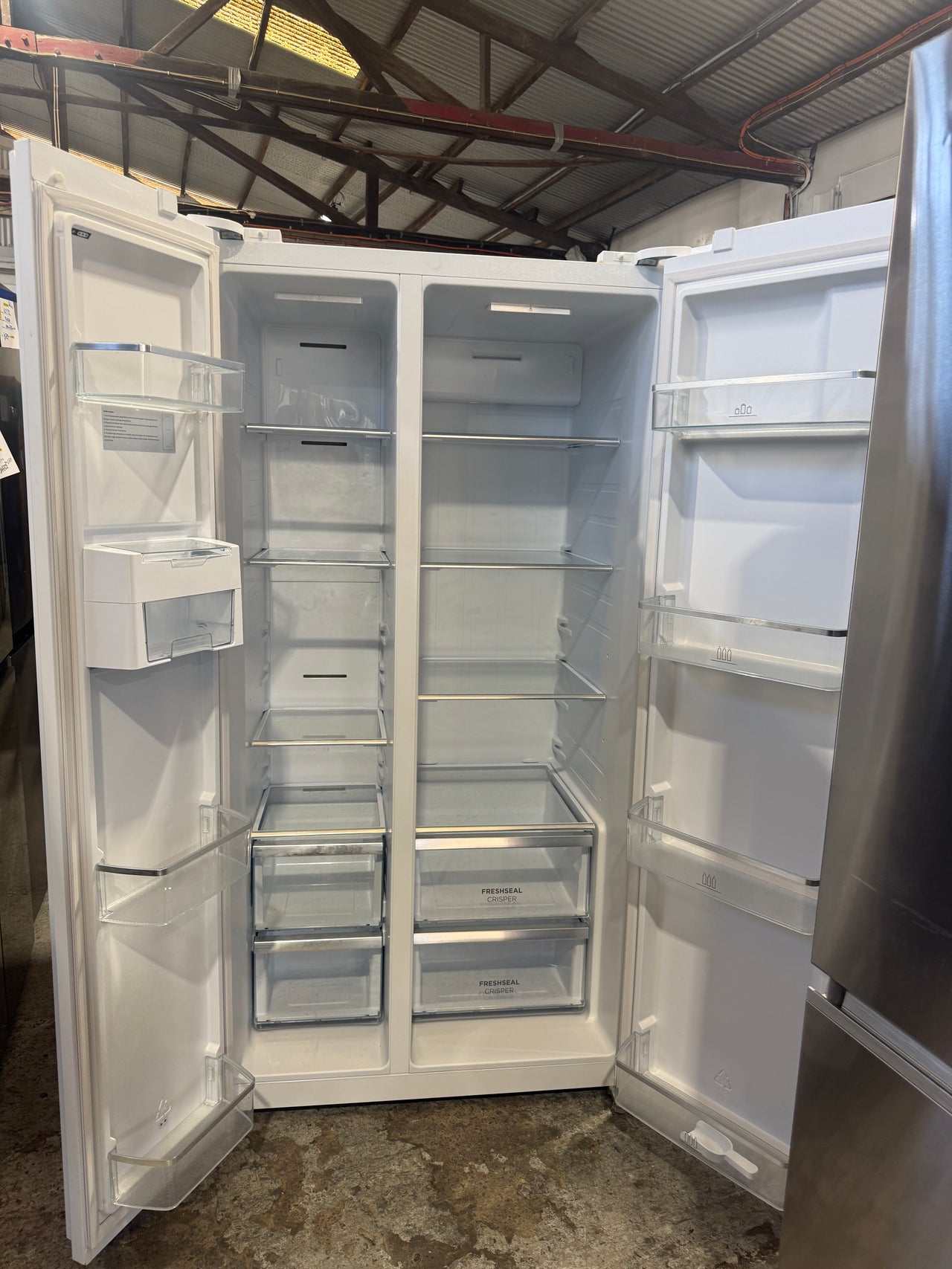 Second hand Westinghouse WSE6630WA 624L Side by Side Fridge