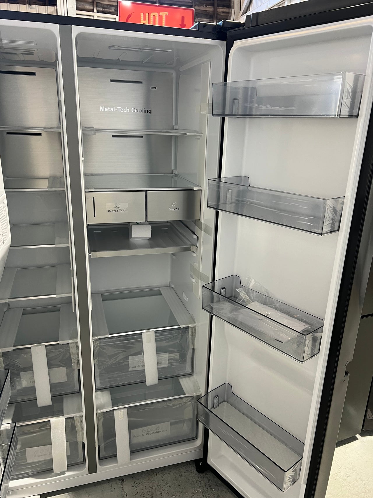 Transportation damaged Hisense 632L Side By Side Refrigerator with non-plumbed water and ice dispenser  HRSBS632BW - Second Hand Appliances Geebung