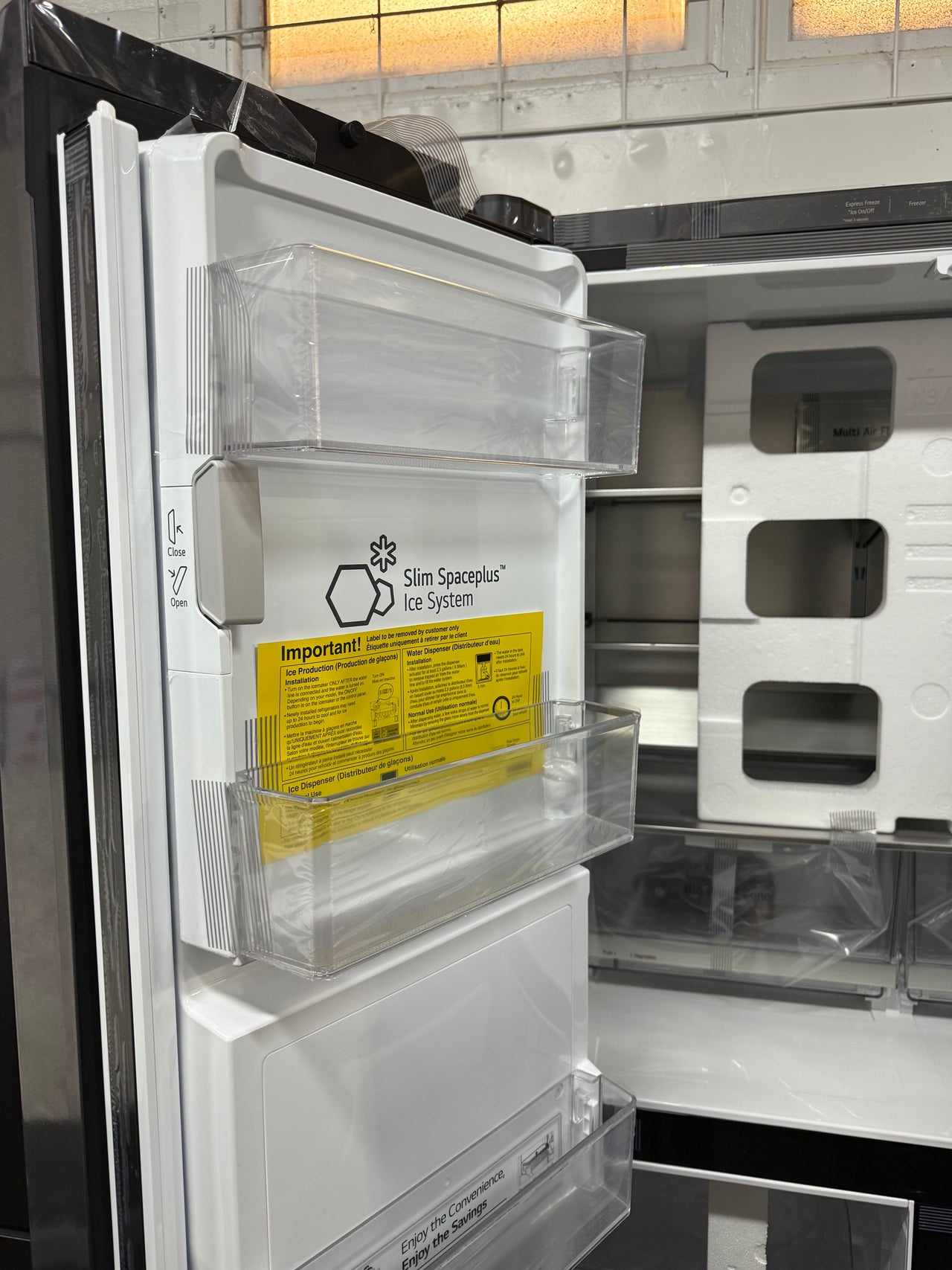 Transportation damaged LG 637L French Door Refrigerator GF-L700MBL
