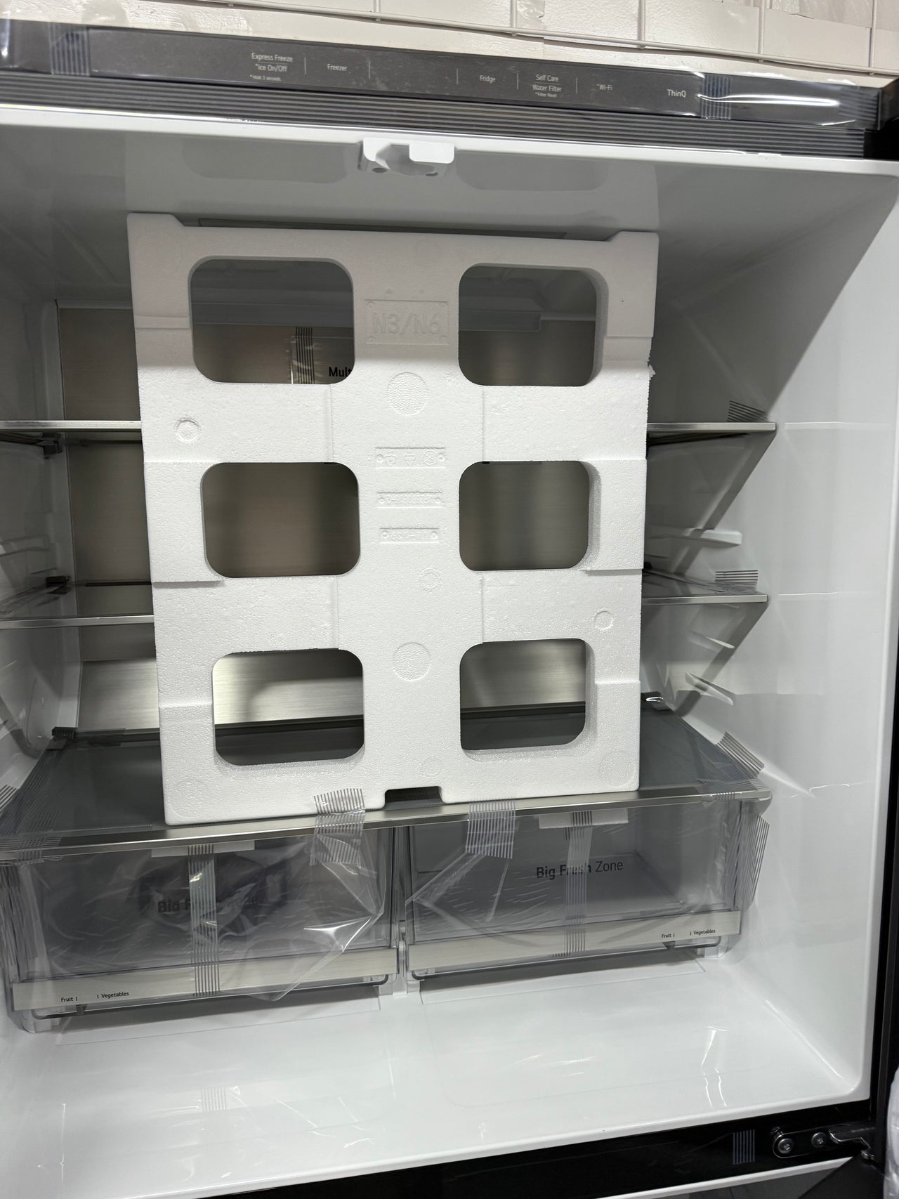 Transportation damaged LG 637L French Door Refrigerator GF-L700MBL