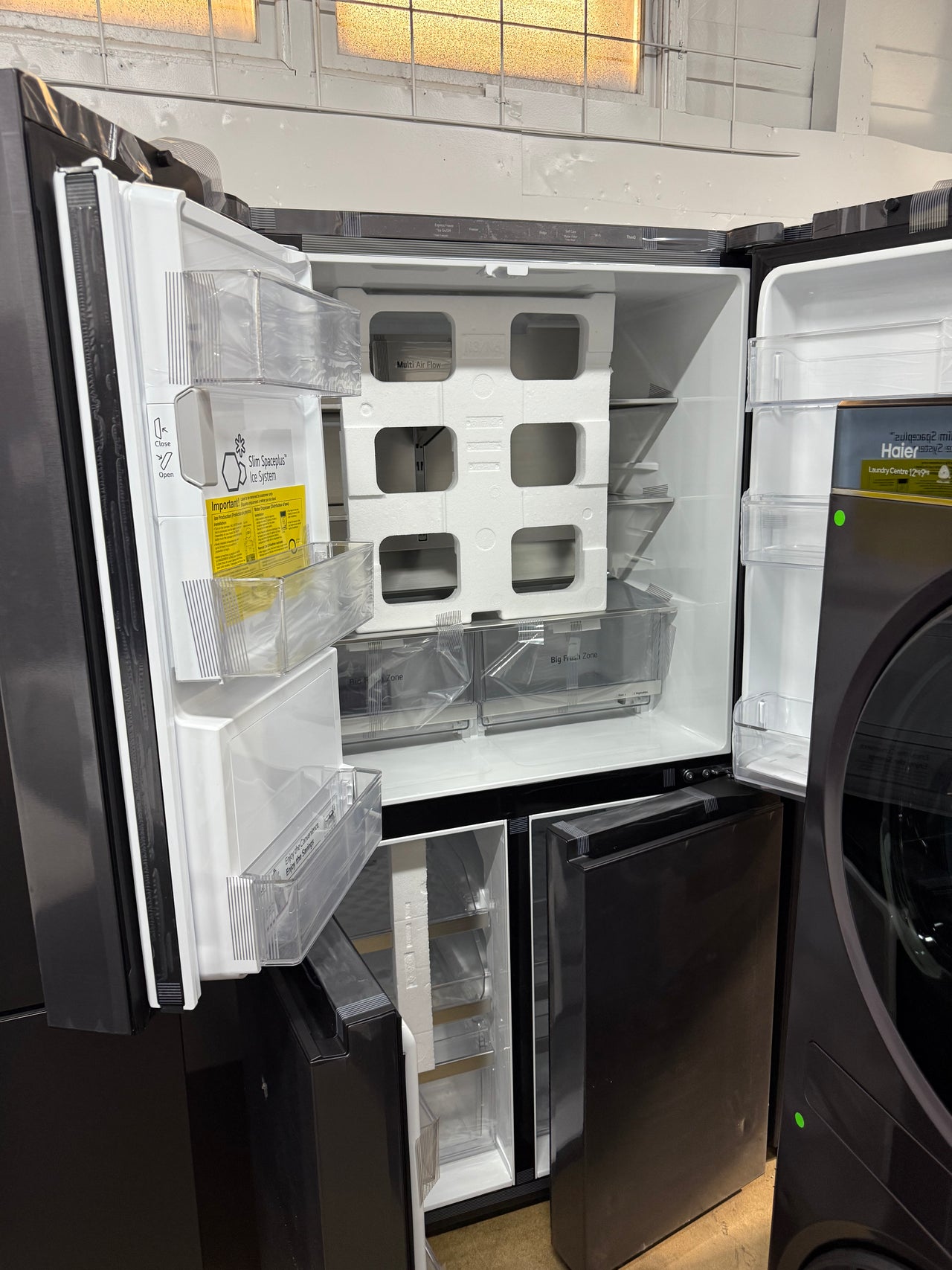 Transportation damaged LG 637L French Door Refrigerator GF-L700MBL