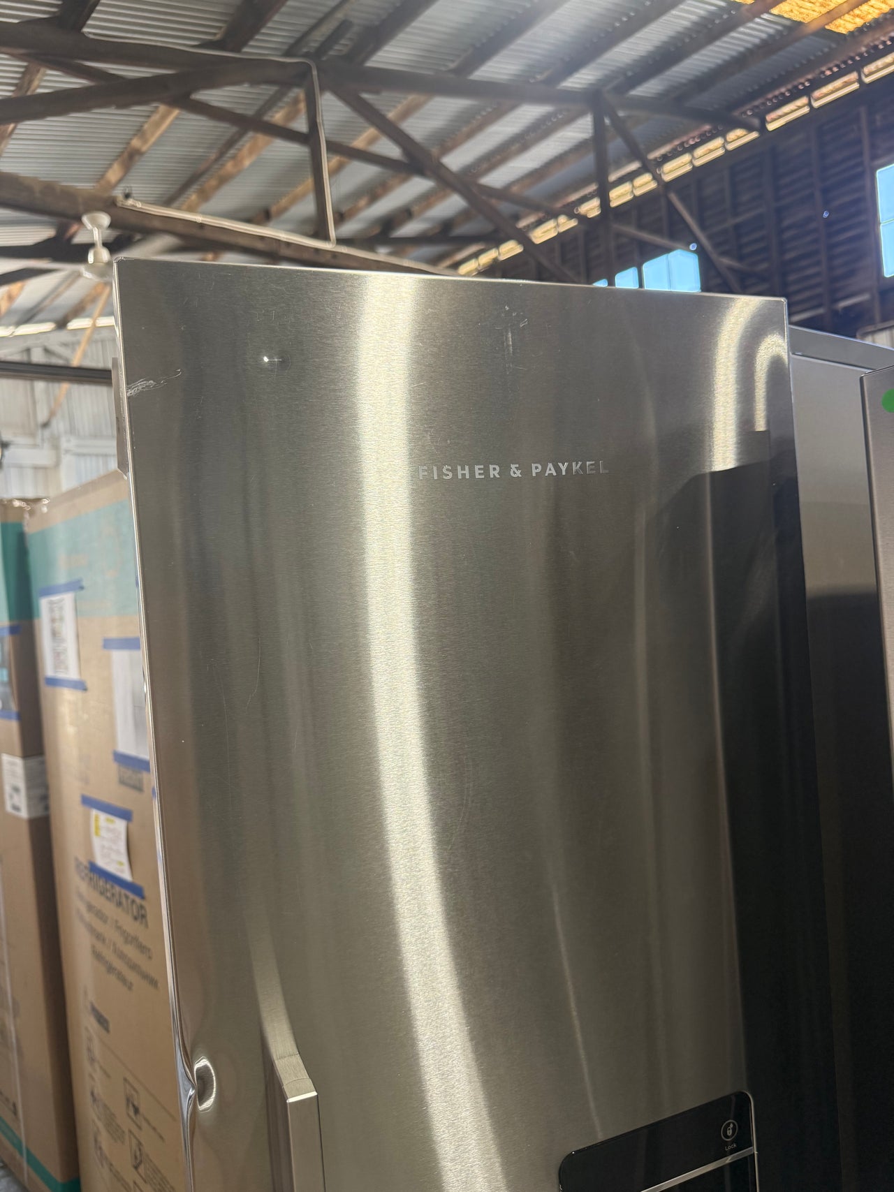 Factory second Fisher & Paykel RF610ADUX5 569L French Door Fridge with Ice & Water