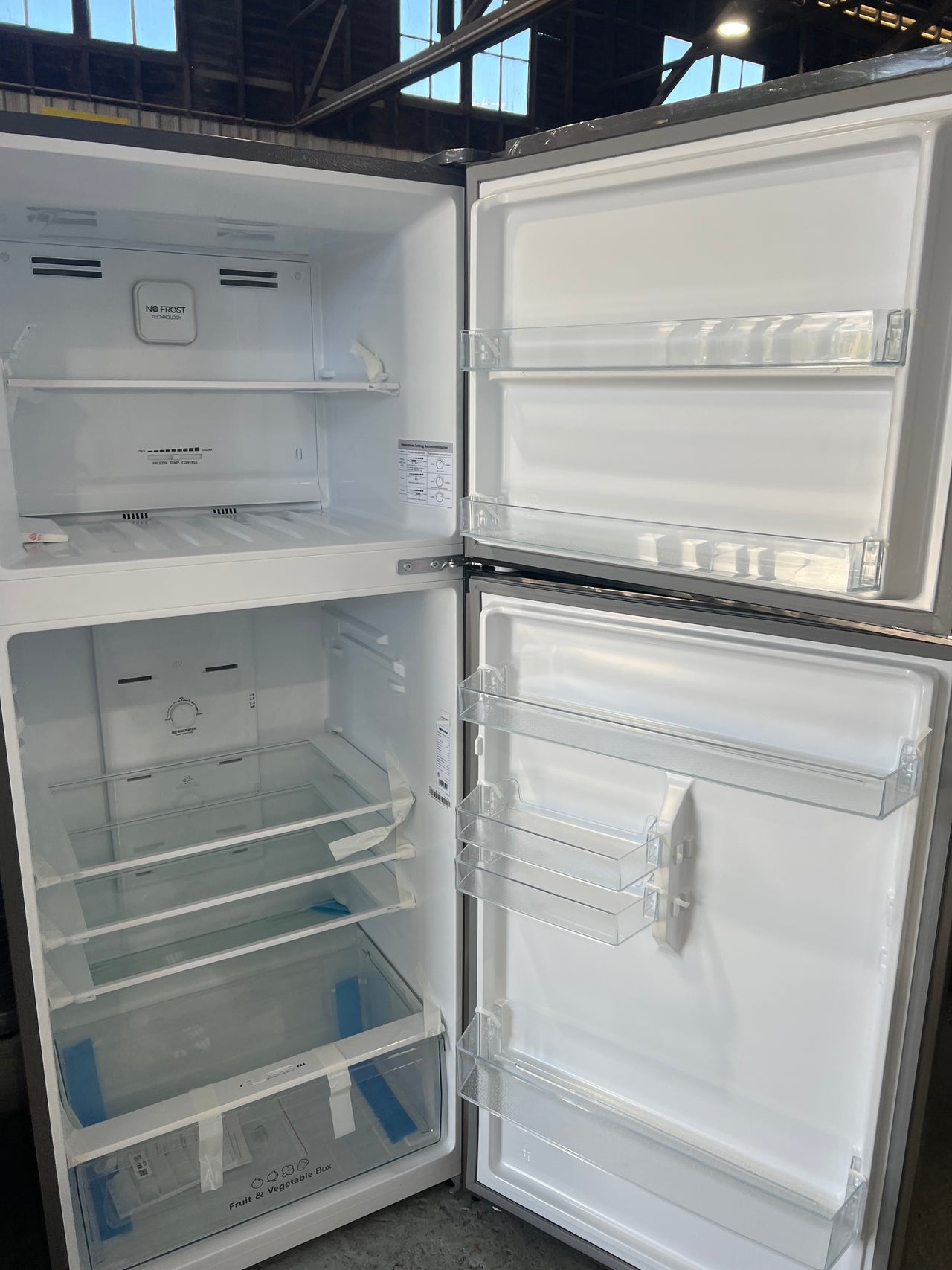 Transportation damaged Hisense HRTF424S 424L Top Mount Fridge (Stainless Steel) HRTF424S - Second Hand Appliances Geebung