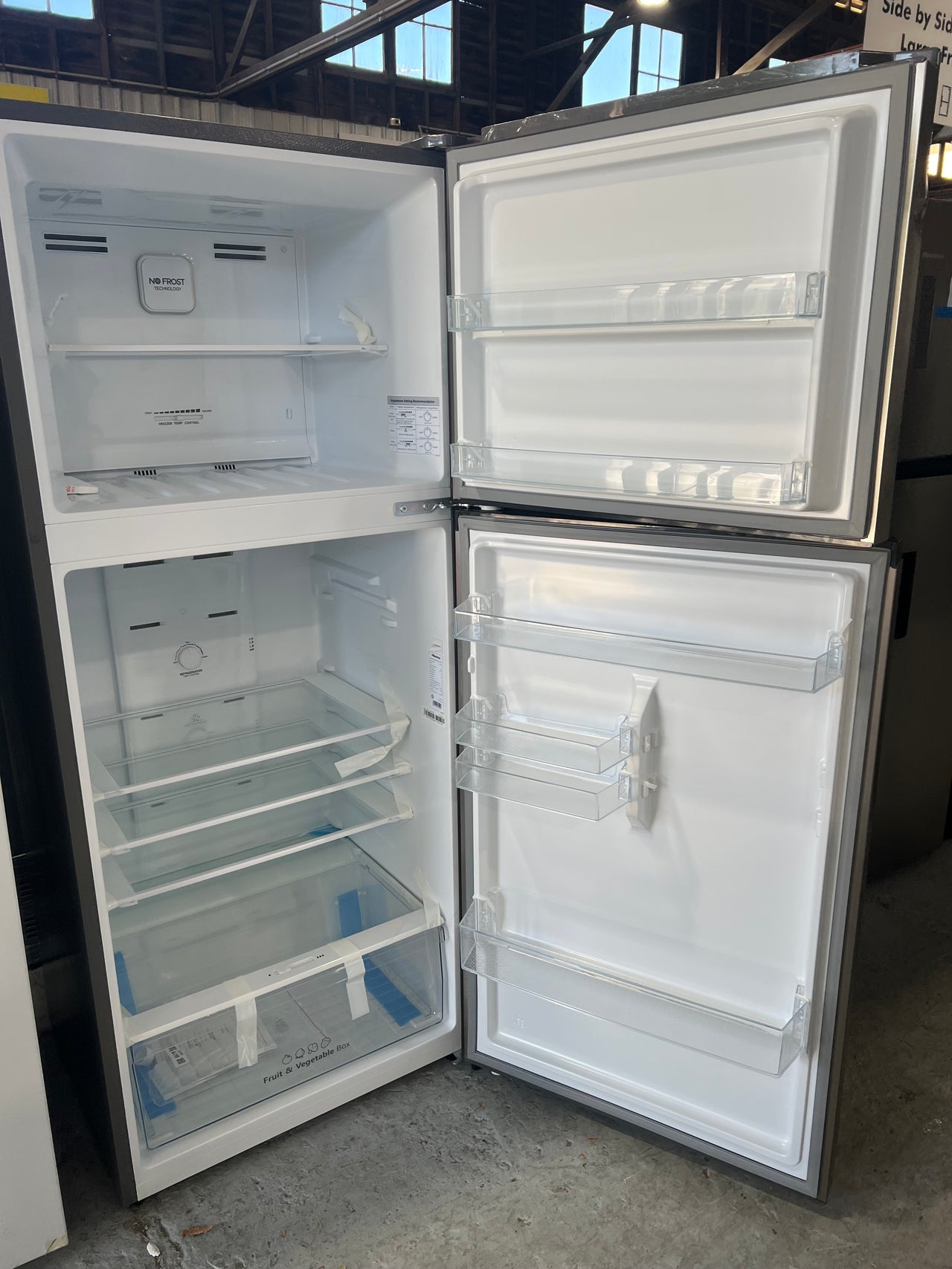 Transportation damaged Hisense HRTF424S 424L Top Mount Fridge (Stainless Steel) HRTF424S - Second Hand Appliances Geebung