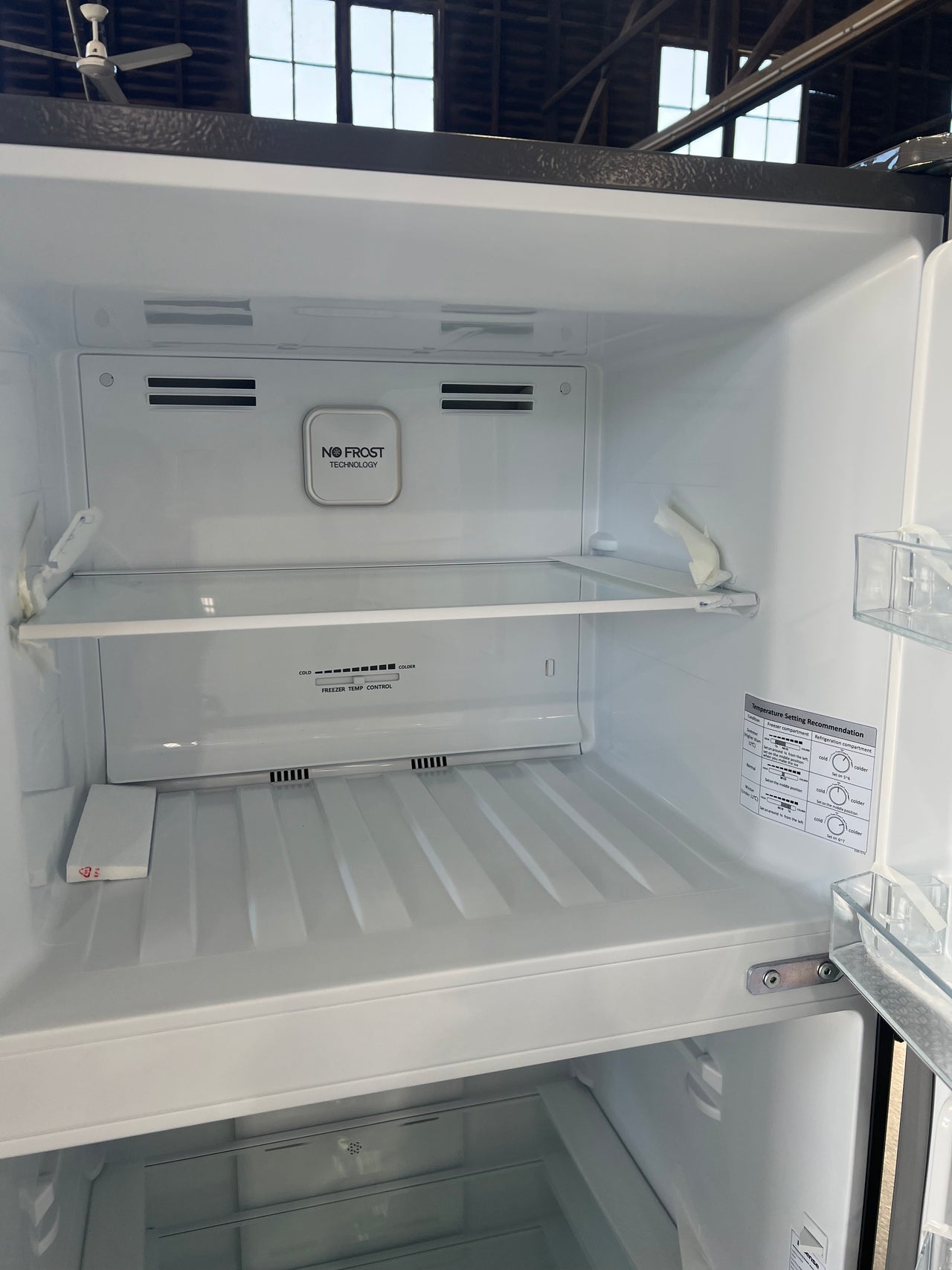 Transportation damaged Hisense HRTF424S 424L Top Mount Fridge (Stainless Steel) HRTF424S - Second Hand Appliances Geebung