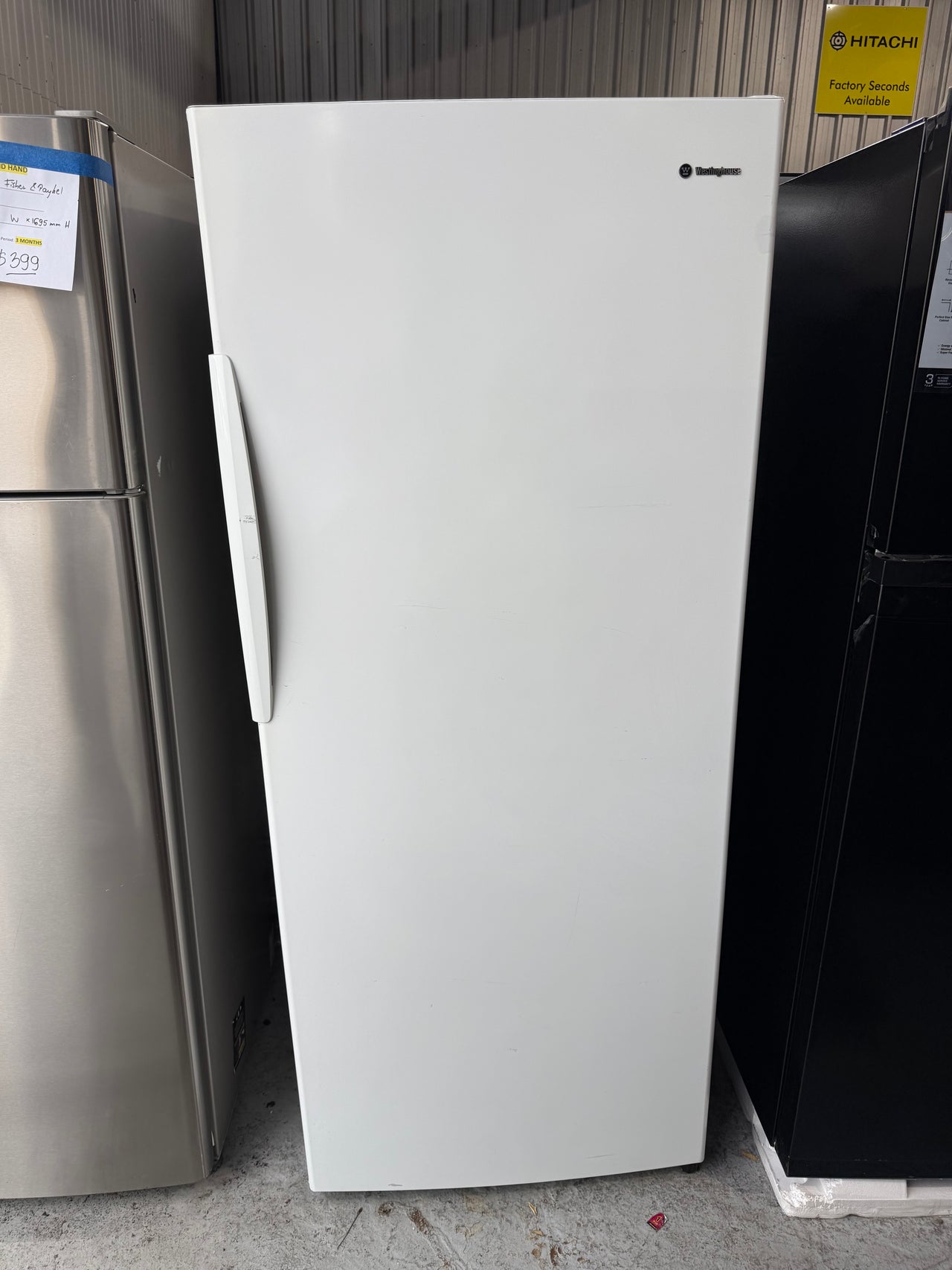 Second hand Westinghouse WFM3600WB-R 360L upright freezer