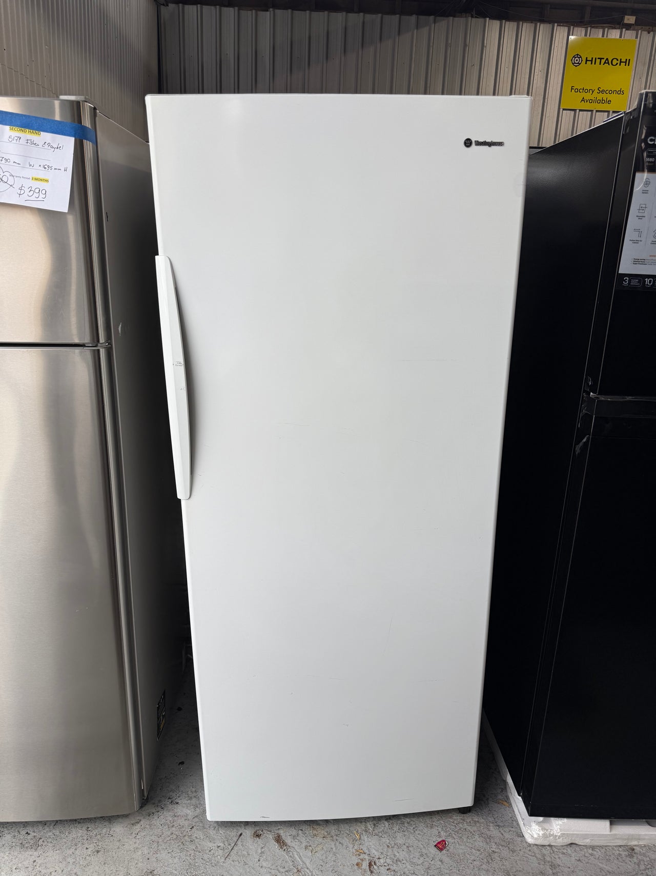 Second hand Westinghouse WFM3600WB-R 360L upright freezer