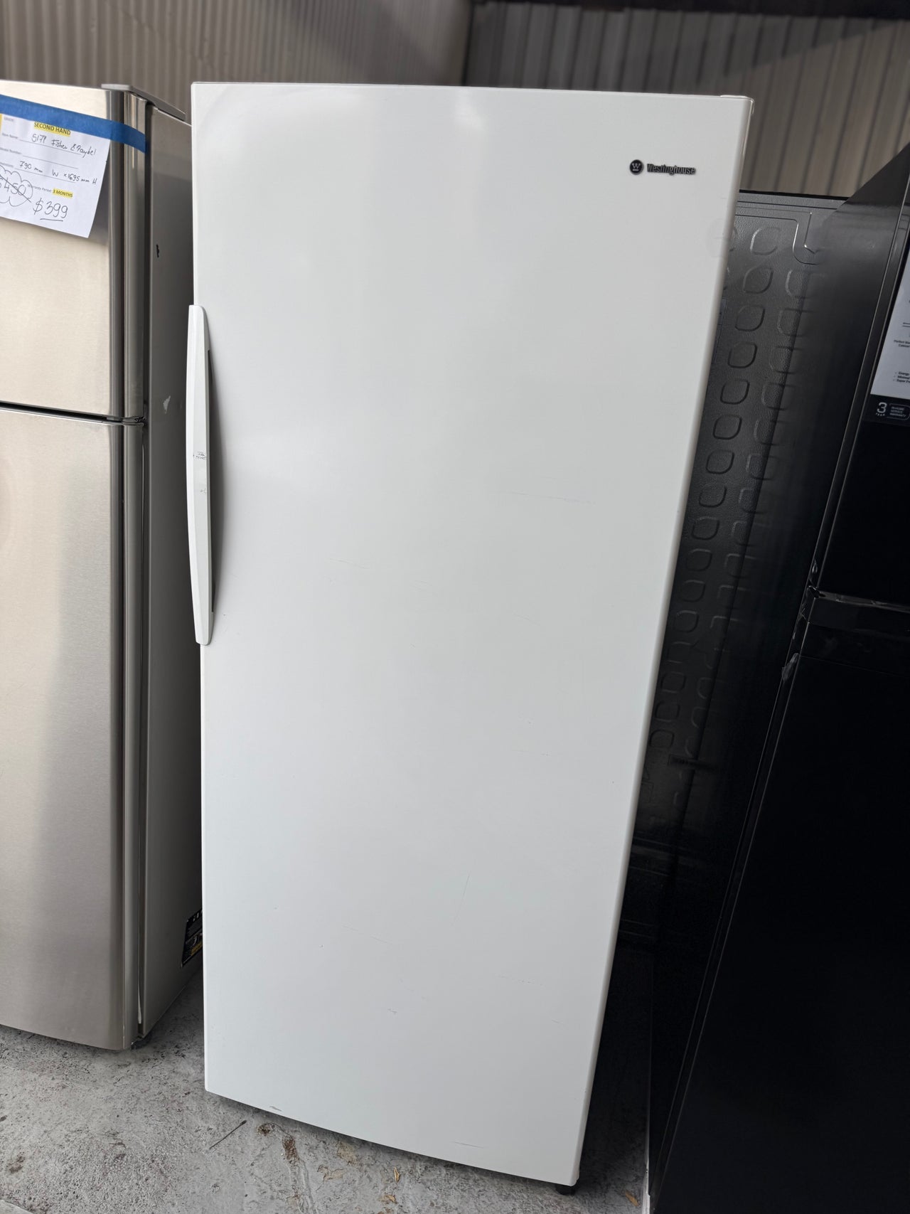 Second hand Westinghouse WFM3600WB-R 360L upright freezer