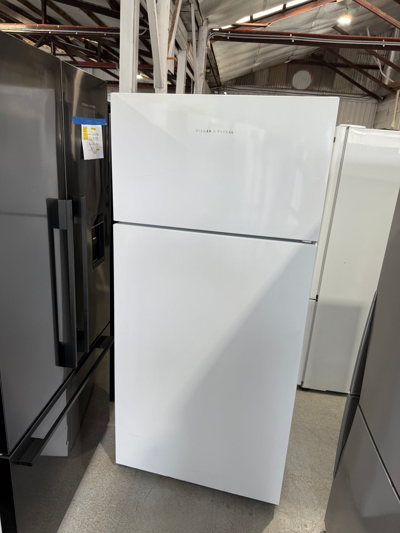 Second hand Fisher&Paykel RF521TRPW6 517-liter top-mount refrigerator