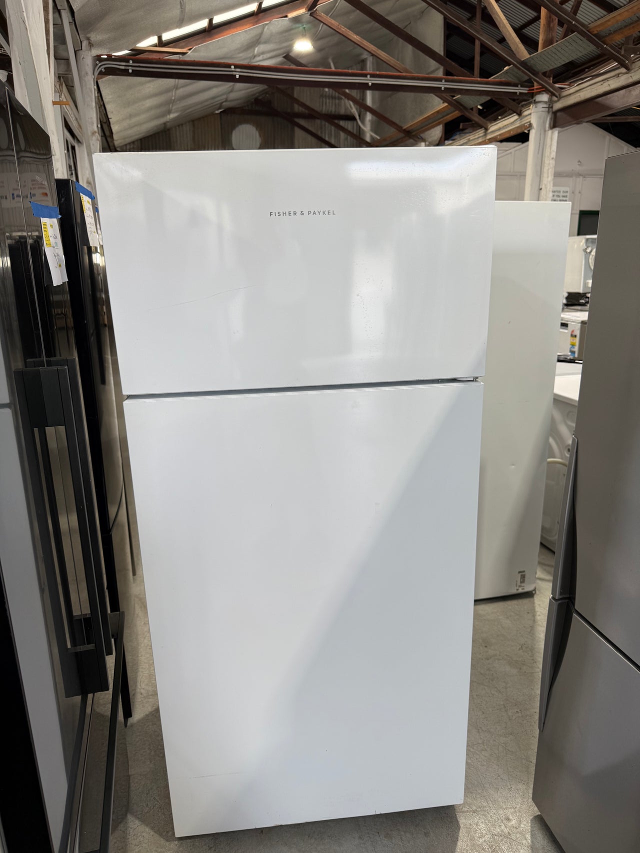 Second hand Fisher&Paykel RF521TRPW6 517-liter top-mount refrigerator