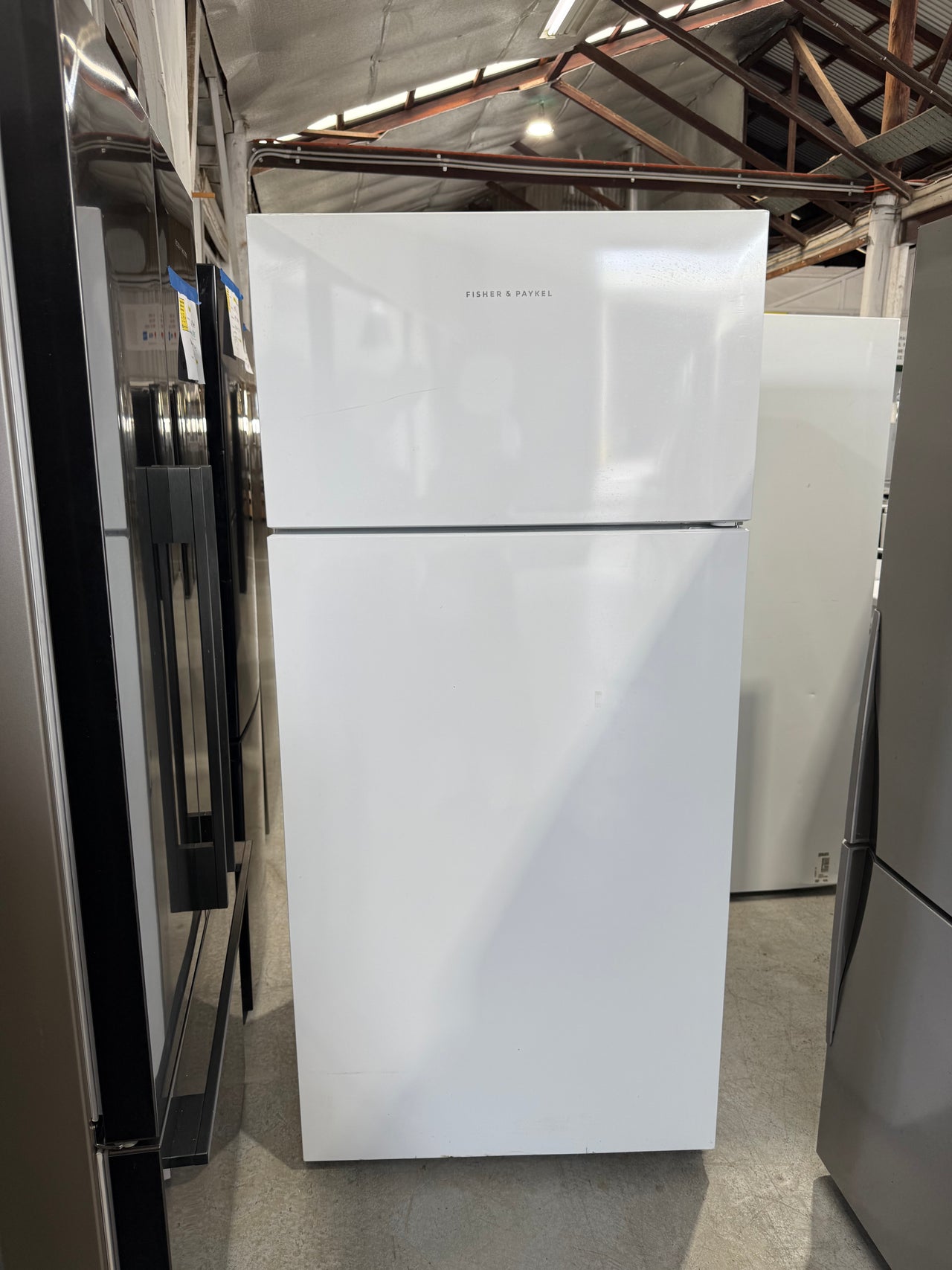 Second hand Fisher&Paykel RF521TRPW6 517-liter top-mount refrigerator