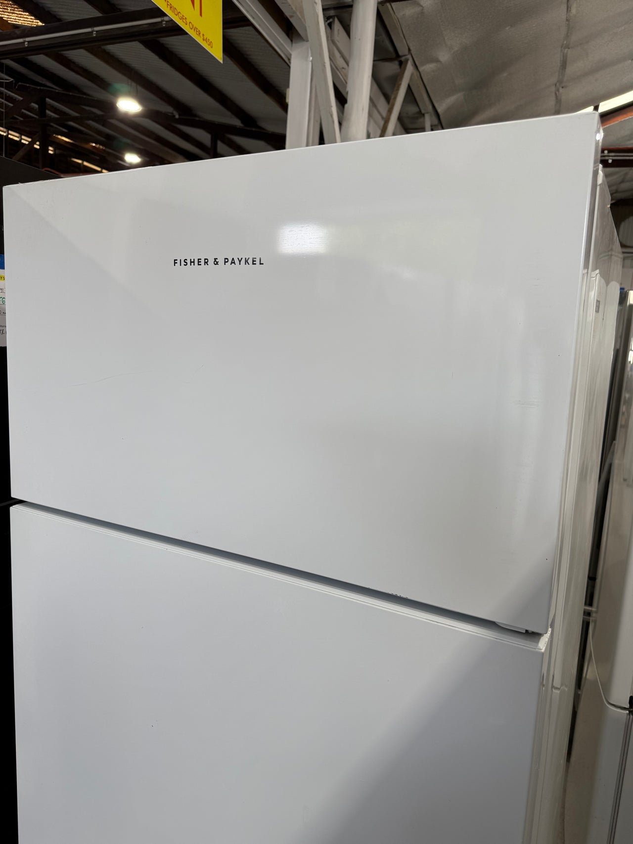 Second hand Fisher&Paykel RF521TRPW6 517-liter top-mount refrigerator