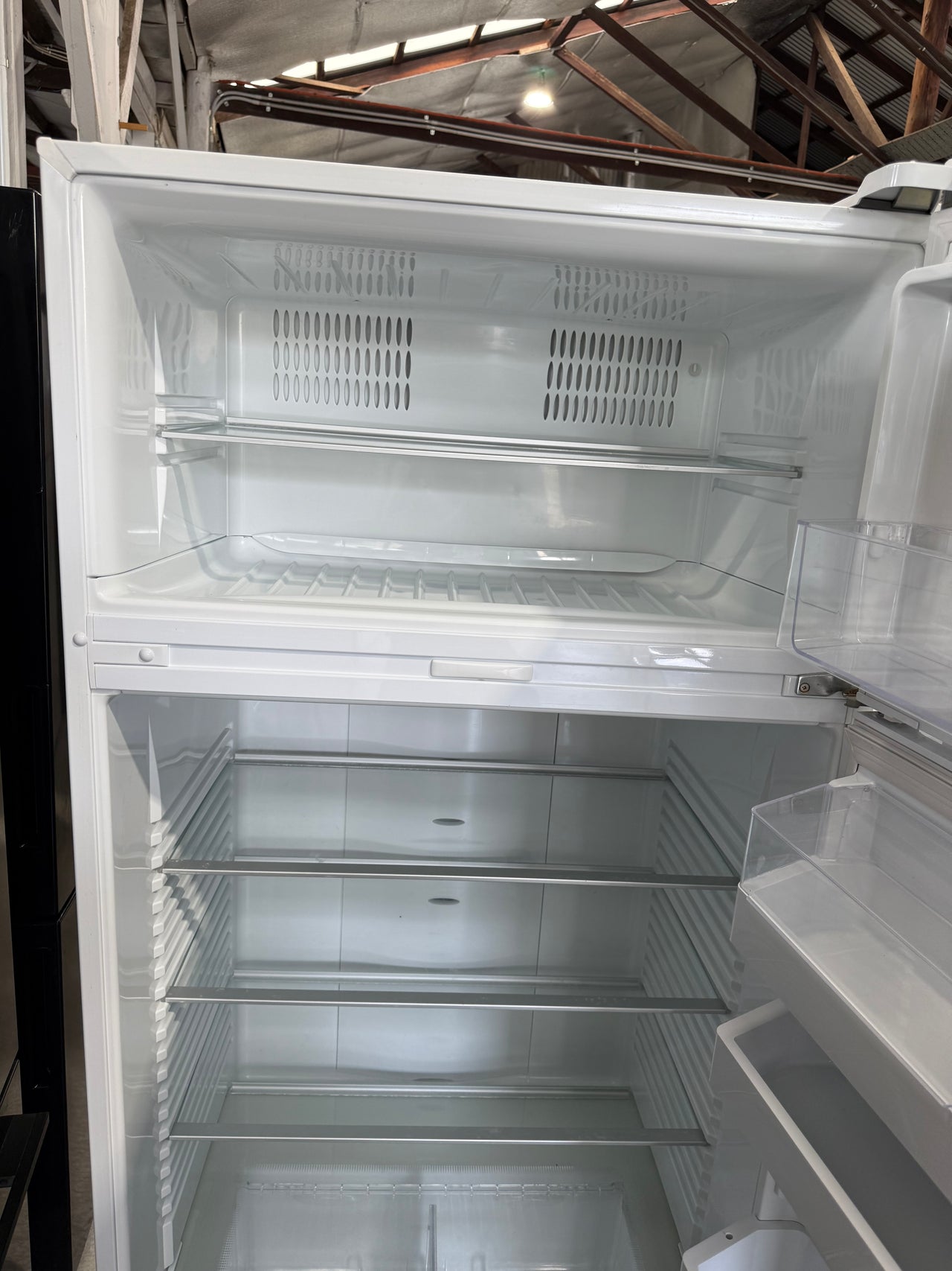 Second hand Fisher&Paykel RF521TRPW6 517-liter top-mount refrigerator