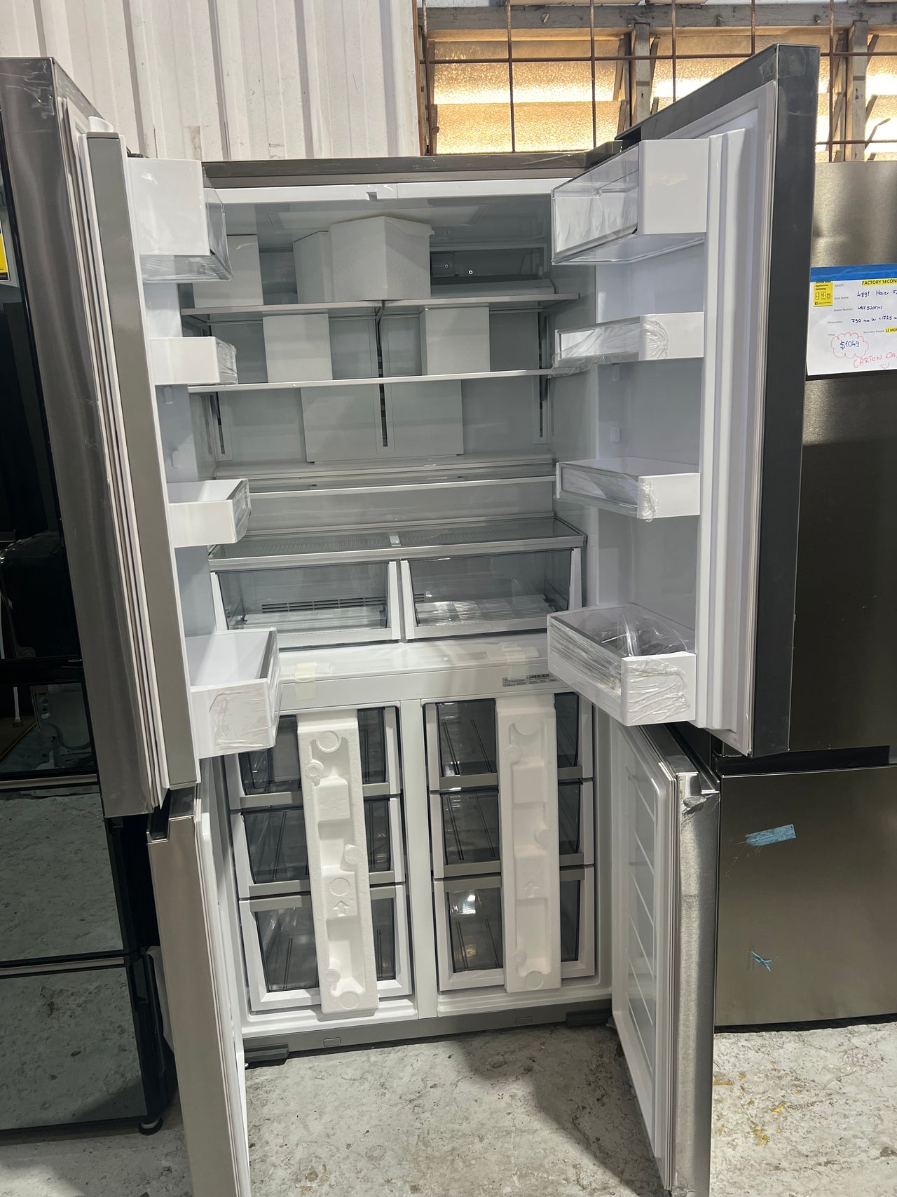 Transportation damaged Fisher & Paykel 538L Quad Door Refrigerator - Stainless Steel Model: RF605QNUVX1 - Second Hand Appliances Geebung