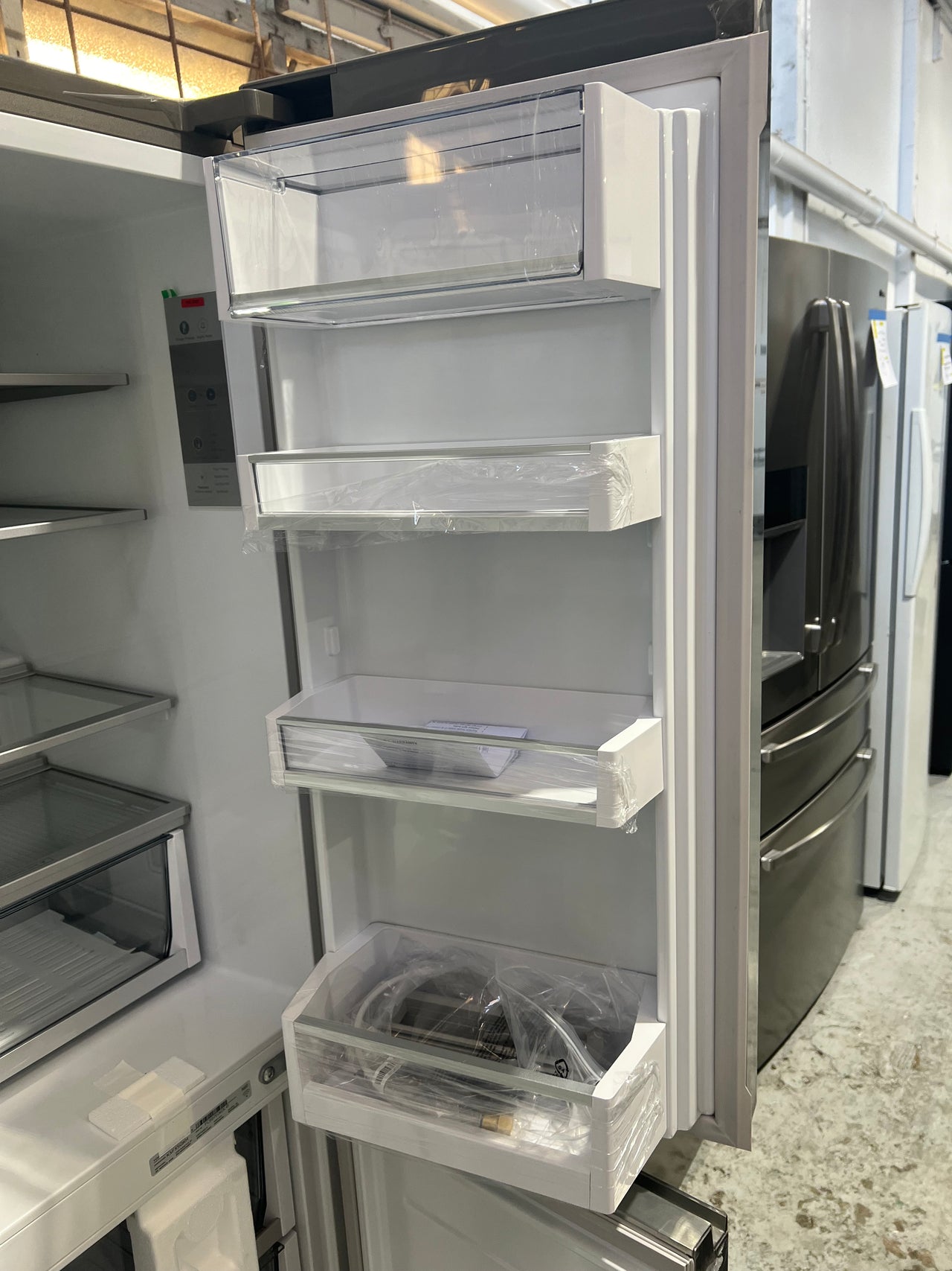 Transportation damaged Fisher & Paykel 538L Quad Door Refrigerator - Stainless Steel Model: RF605QNUVX1 - Second Hand Appliances Geebung