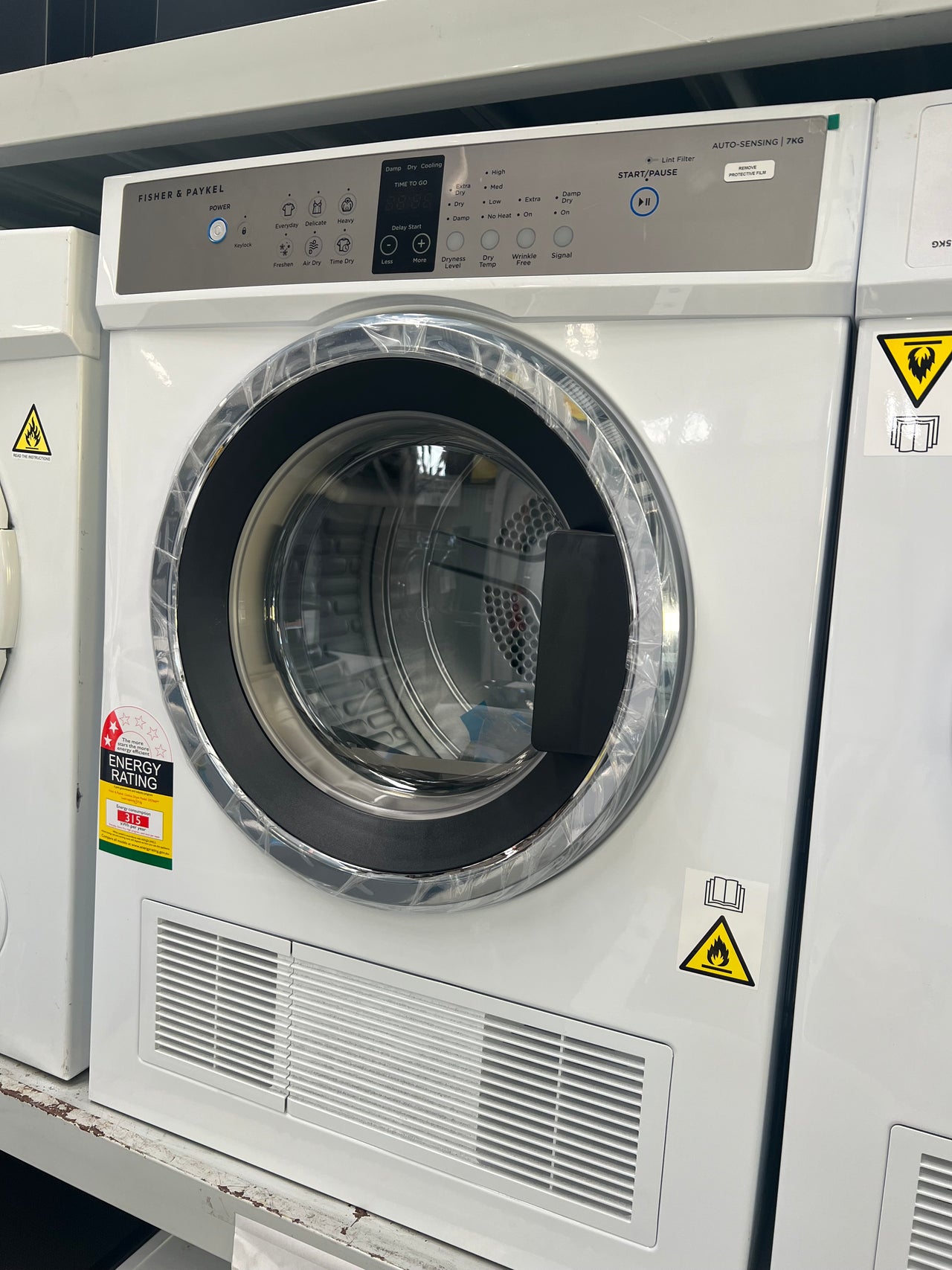 Transportation damaged Fisher&Paykel Fisher &amp; Paykel&nbsp;7kg Sensor Dryer Model: DE7060G2 - Second Hand Appliances Geebung