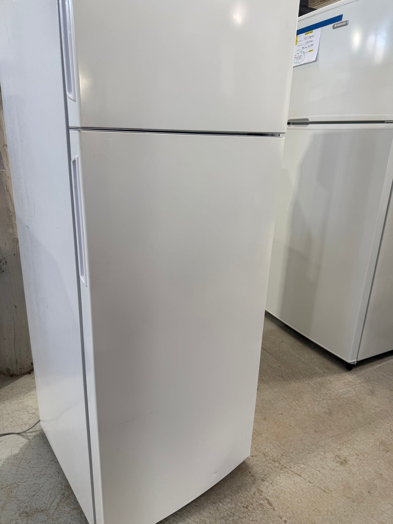 Second hand Kelvinator KTB2802WB 256-liter top-mount refrigerator