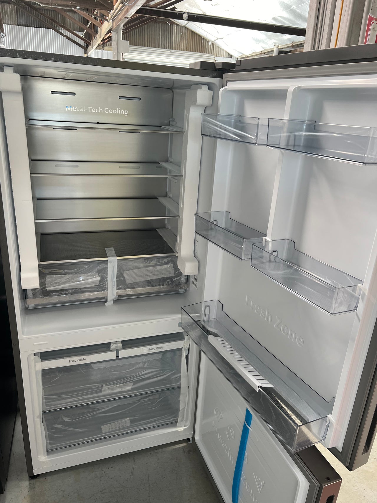 Transportation damaged Hisense 503L Bottom Mount Fridge - Silver HRBM503S - Second Hand Appliances Geebung