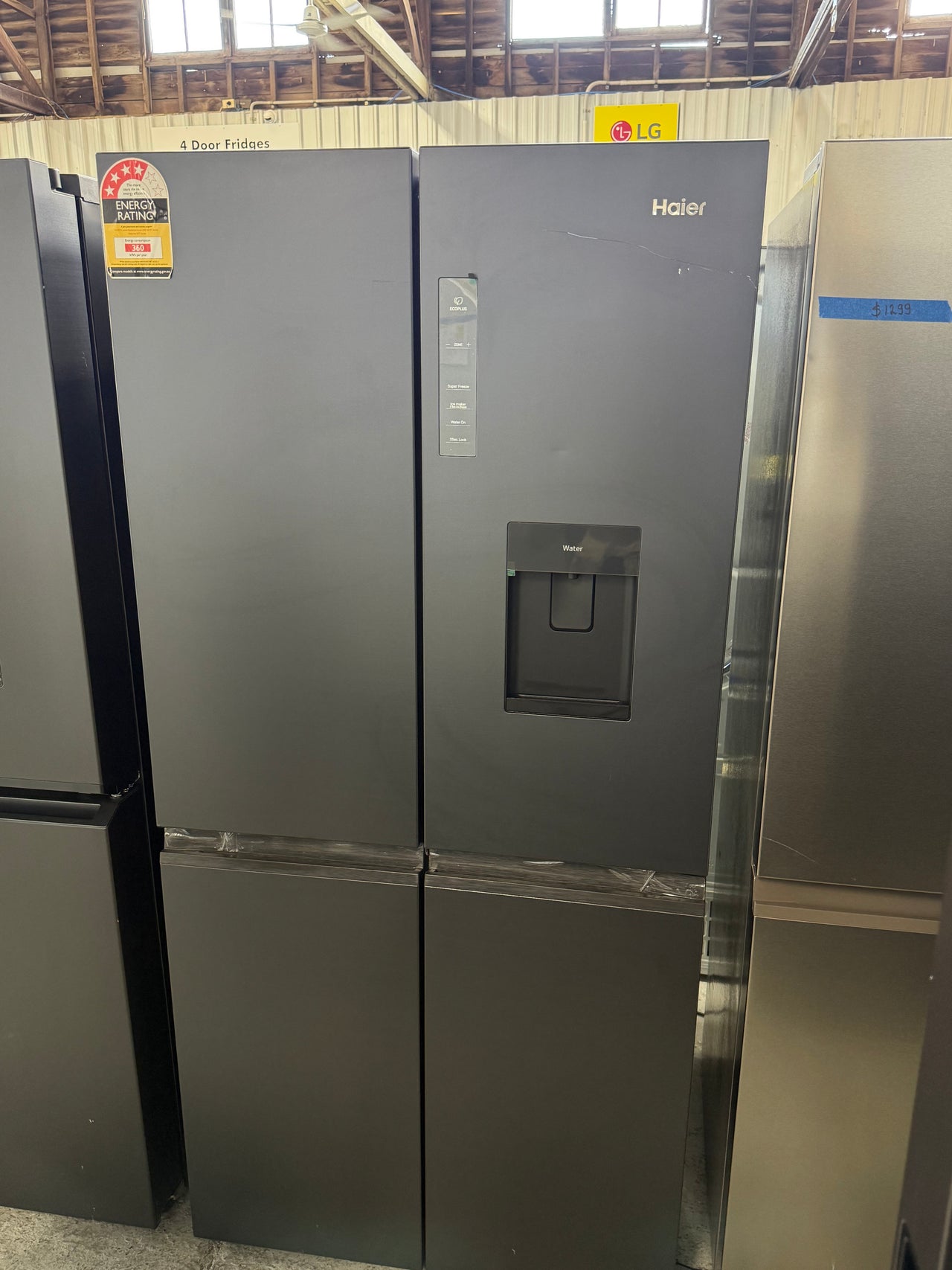 Transportation damaged Haier 508L Quad Door Fridge Black HRF580YPC