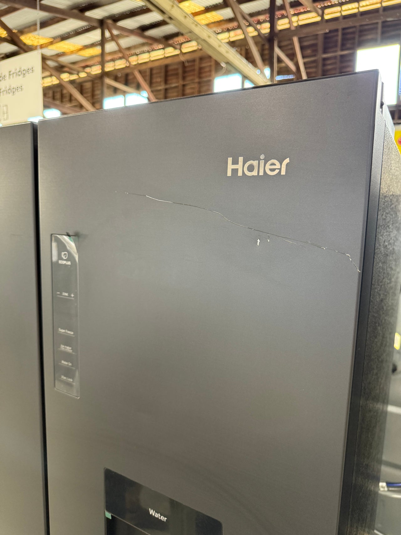 Transportation damaged Haier 508L Quad Door Fridge Black HRF580YPC