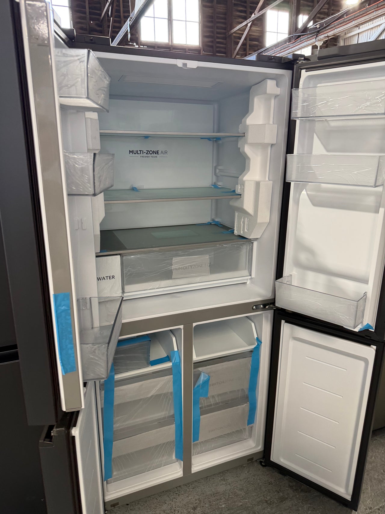 Transportation damaged Haier 508L Quad Door Fridge Black HRF580YPC