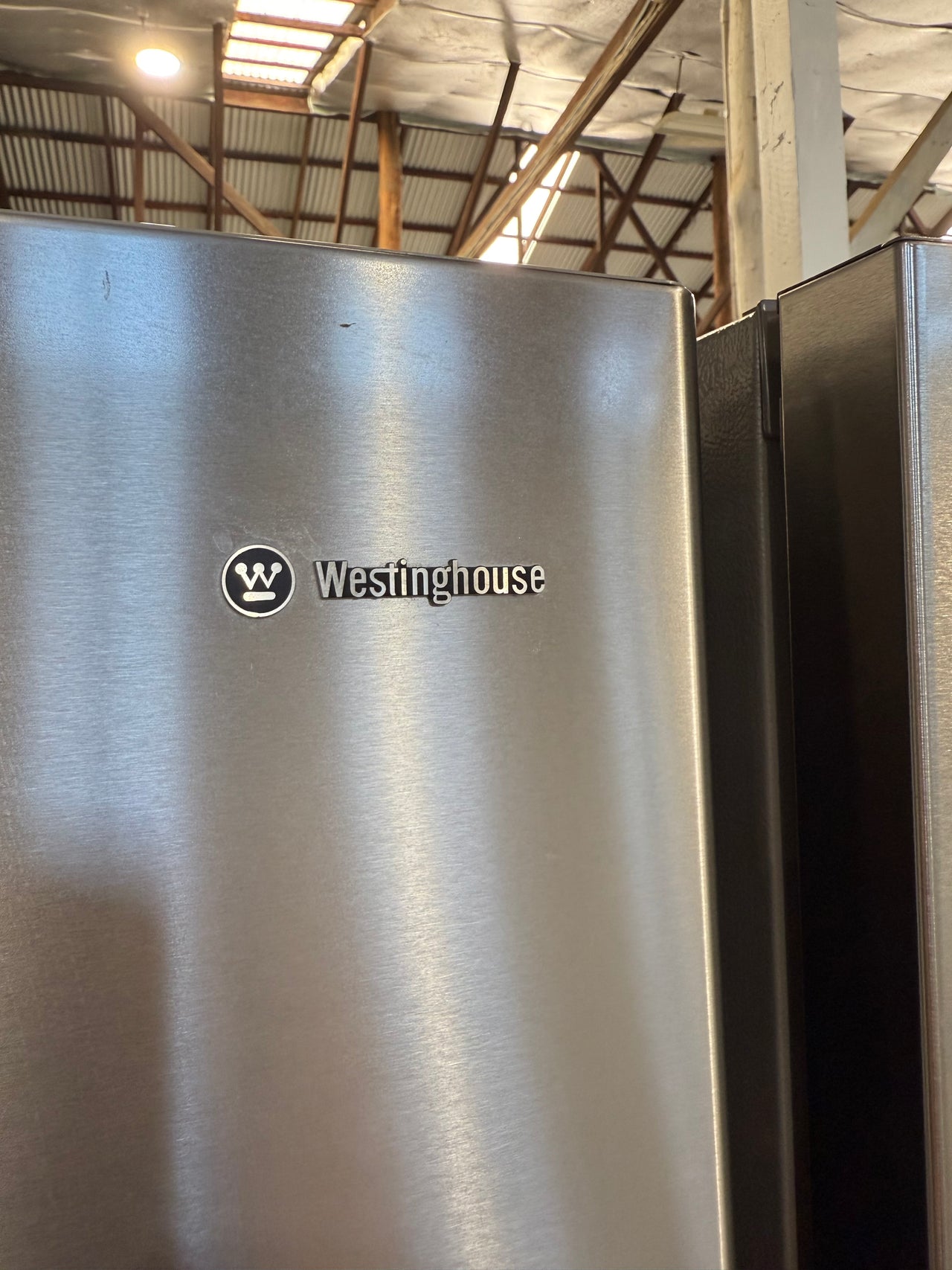 Second hand Westinghouse WTM3900SB 390-liter top-mount refrigerator