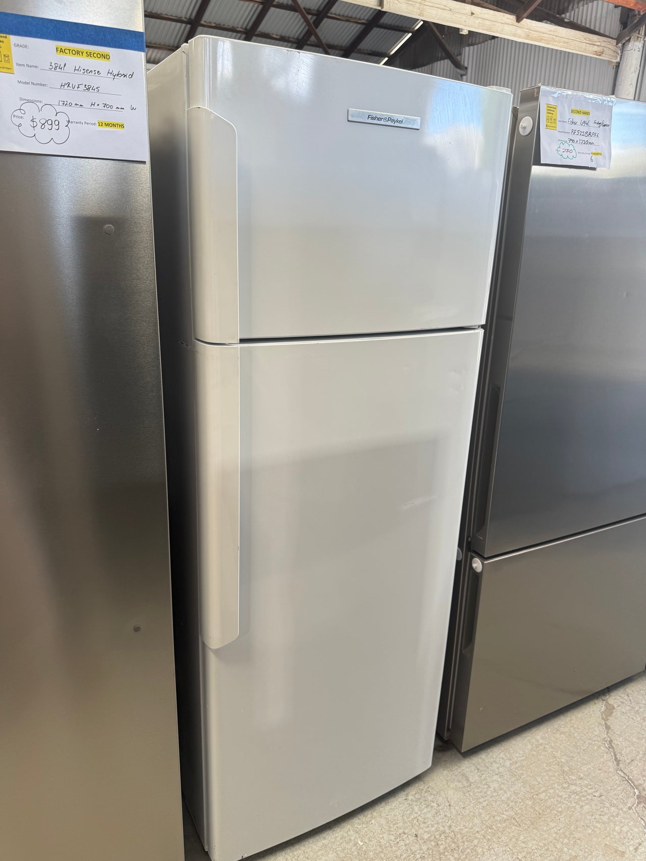 Second hand Fisher & Paykel E411TRT3 411-liter top-mount refrigerator