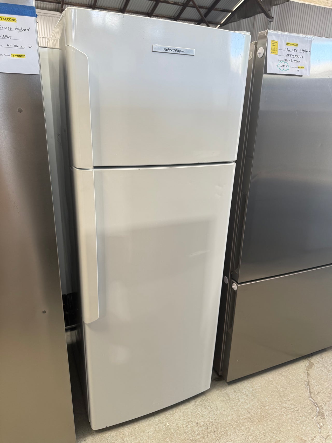 Second hand Fisher & Paykel E411TRT3 411-liter top-mount refrigerator